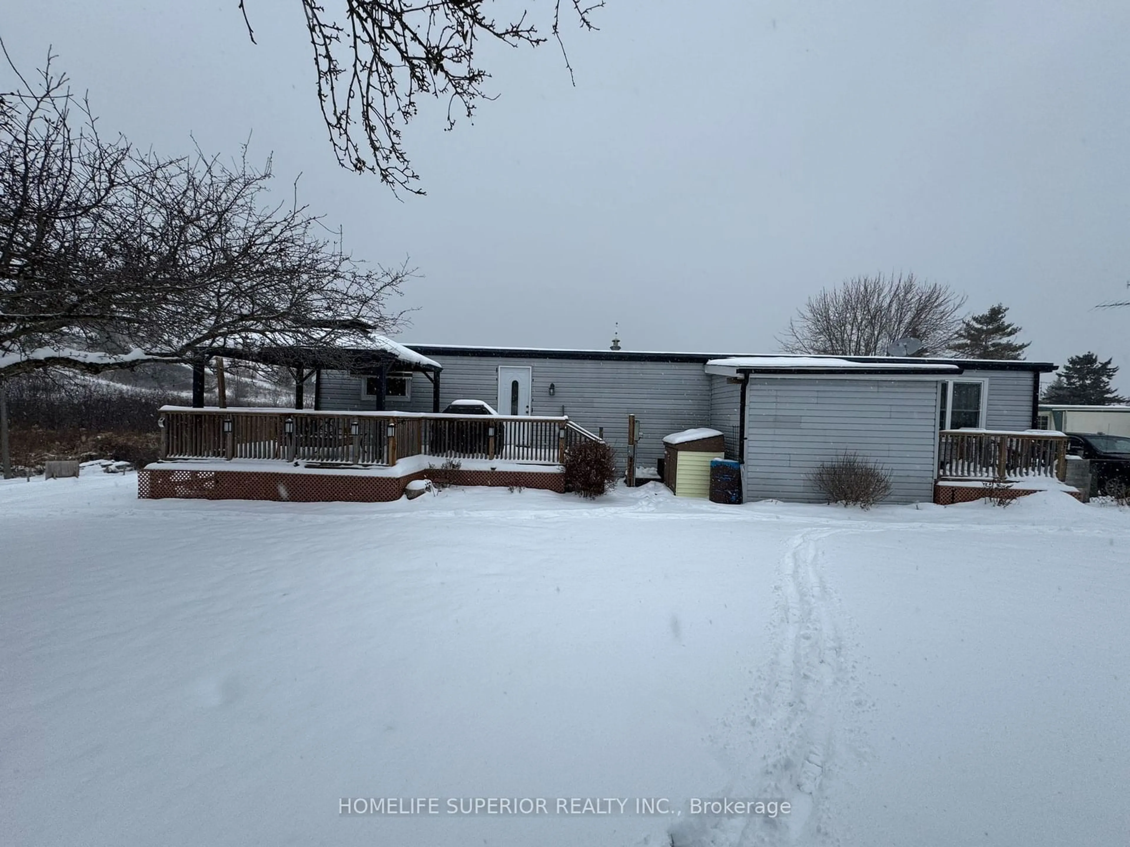 A pic from outside/outdoor area/front of a property/back of a property/a pic from drone, street for 2244 Heritage Line #72B, Otonabee-South Monaghan Ontario K9J 6X8