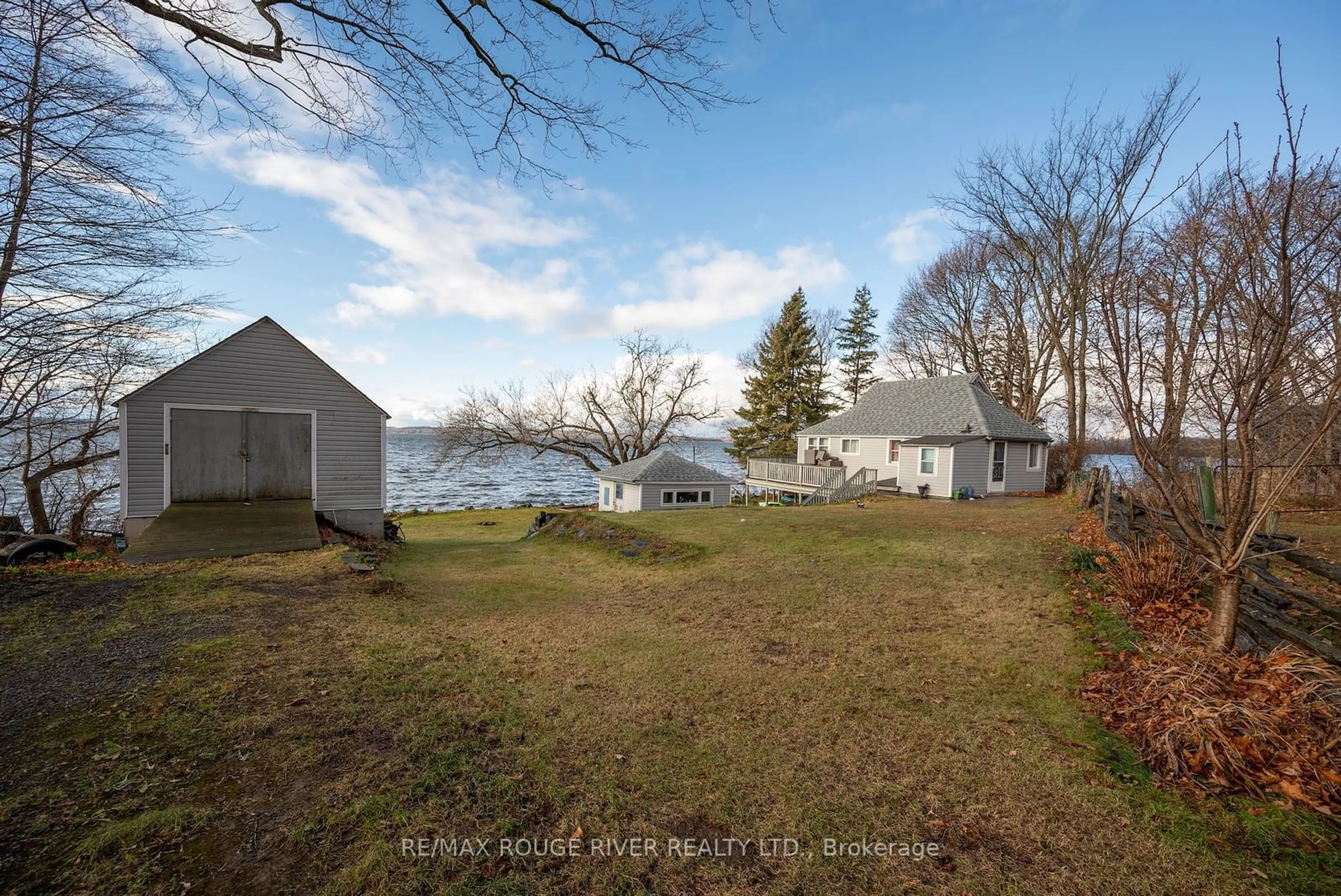 A pic from outside/outdoor area/front of a property/back of a property/a pic from drone, water/lake/river/ocean view for 7214 County Rd 18 Rd #2, Alnwick/Haldimand Ontario K0K 2X0