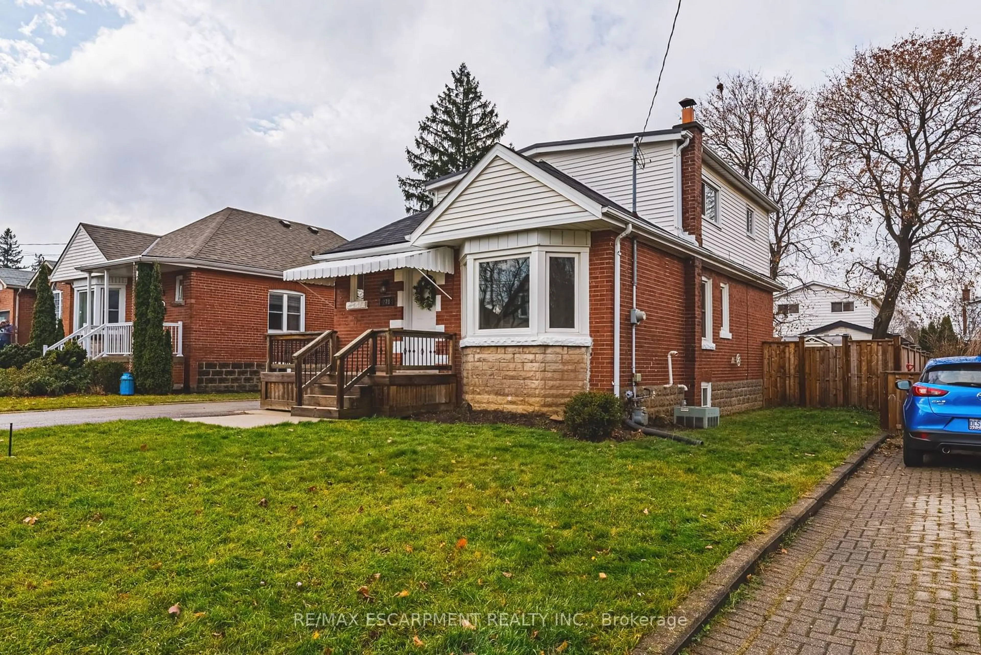 Home with brick exterior material, street for 278 EAST 12TH St, Hamilton Ontario L9A 3X8