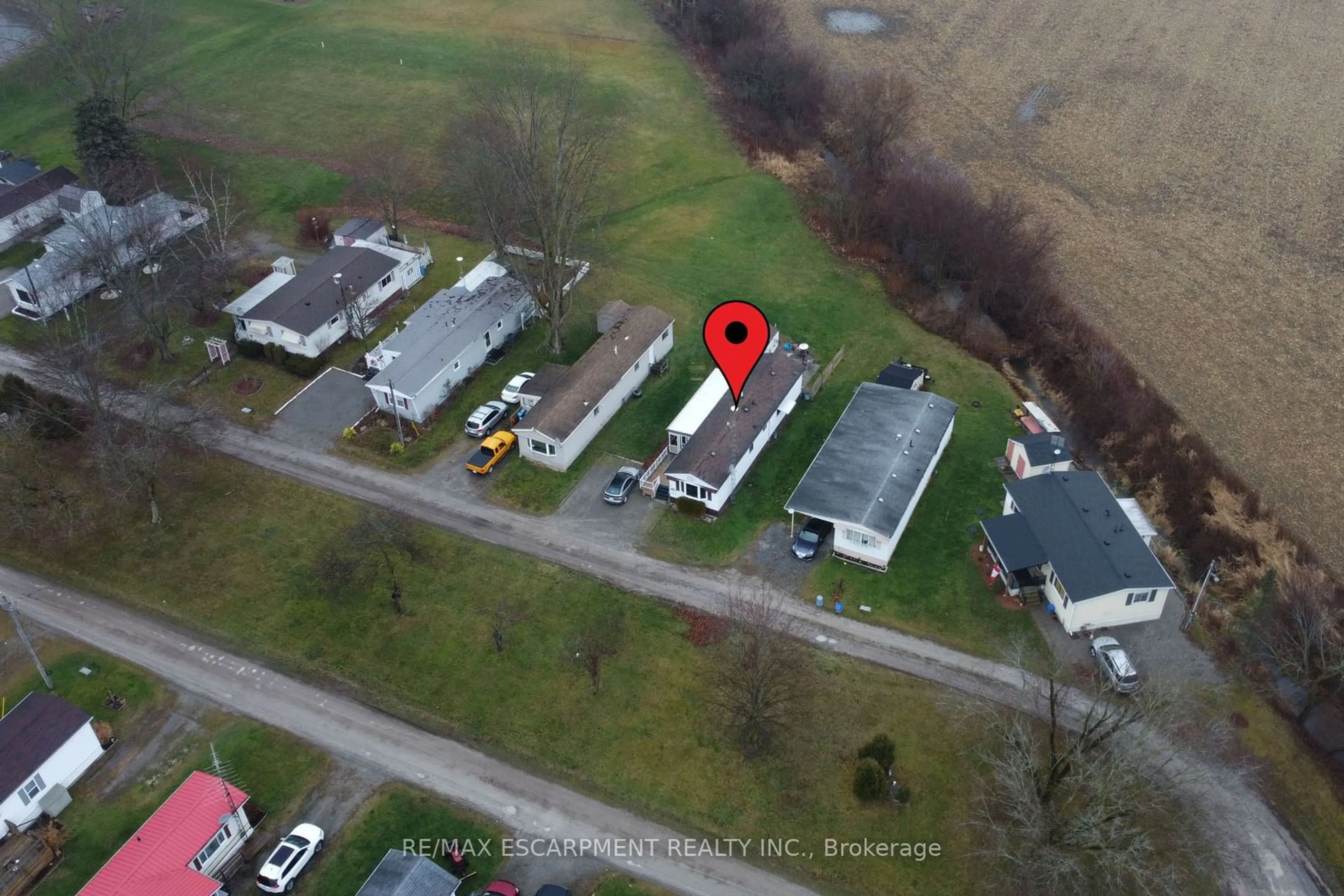 A pic from outside/outdoor area/front of a property/back of a property/a pic from drone, street for 43969 Highway 3 #32, Wainfleet Ontario L0S 1V0