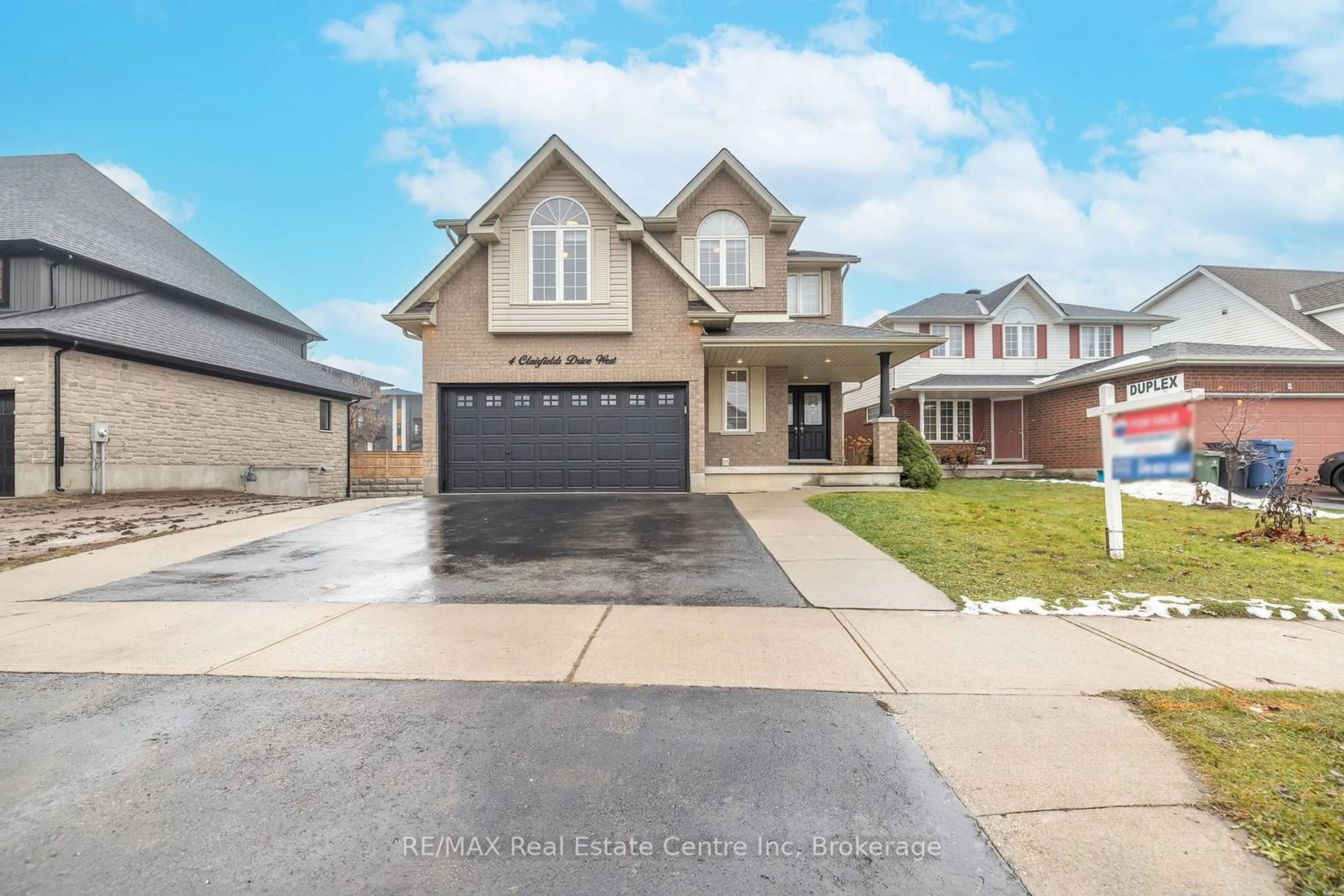 Home with brick exterior material, street for 4 CLAIRFIELDS Dr, Guelph Ontario N1G 5H5