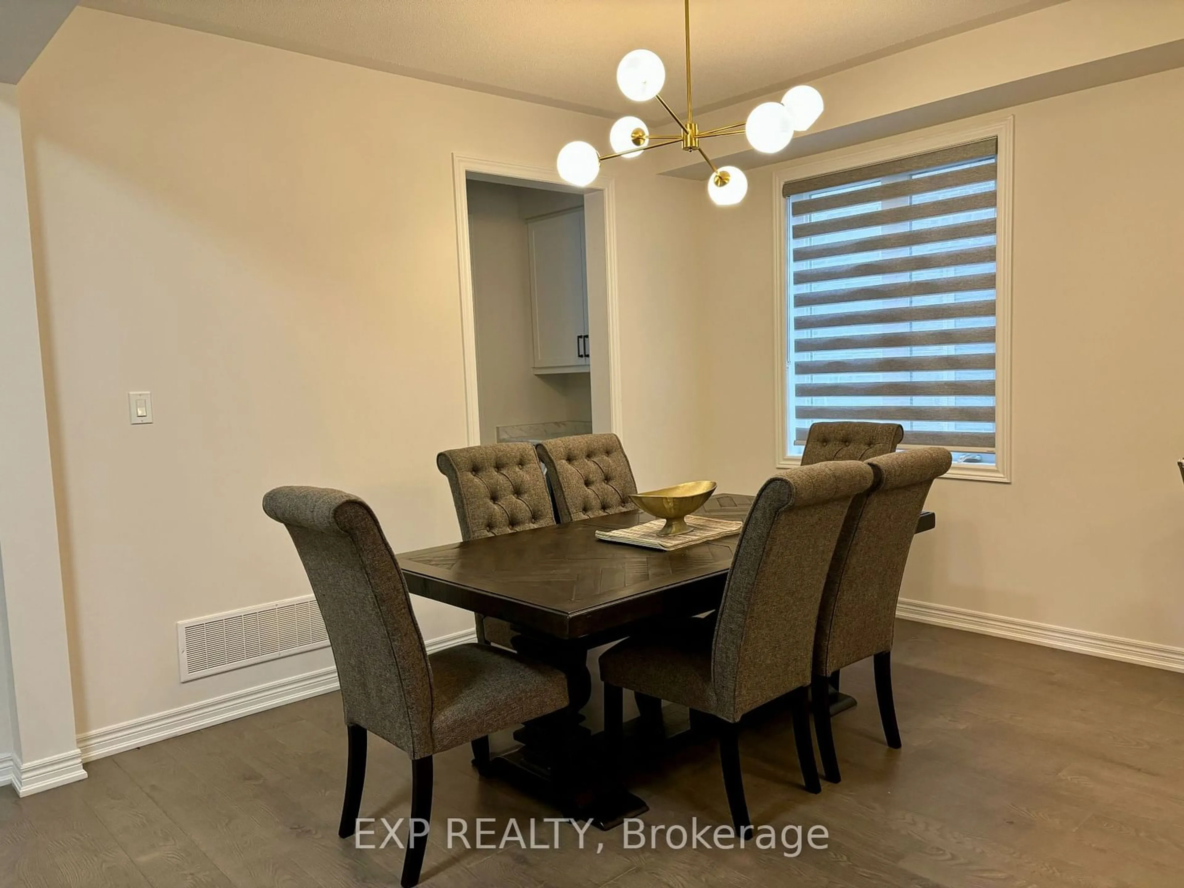 Dining room, wood/laminate floor for 488 Black Cherry Cres, Shelburne Ontario L9V 3Y7