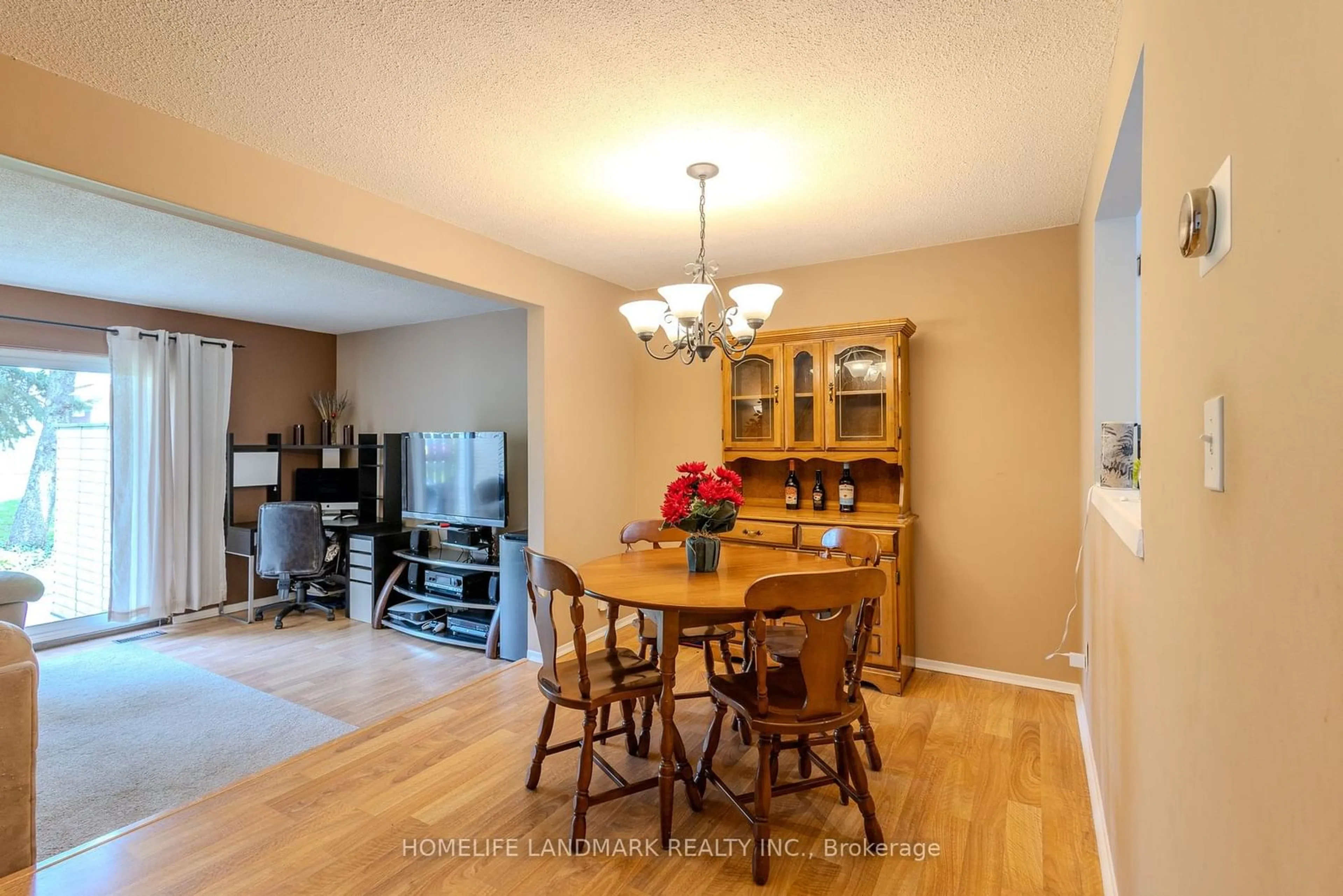 Dining room, wood/laminate floor for 50 Lakeshore Rd #101, St. Catharines Ontario L2N 6P8