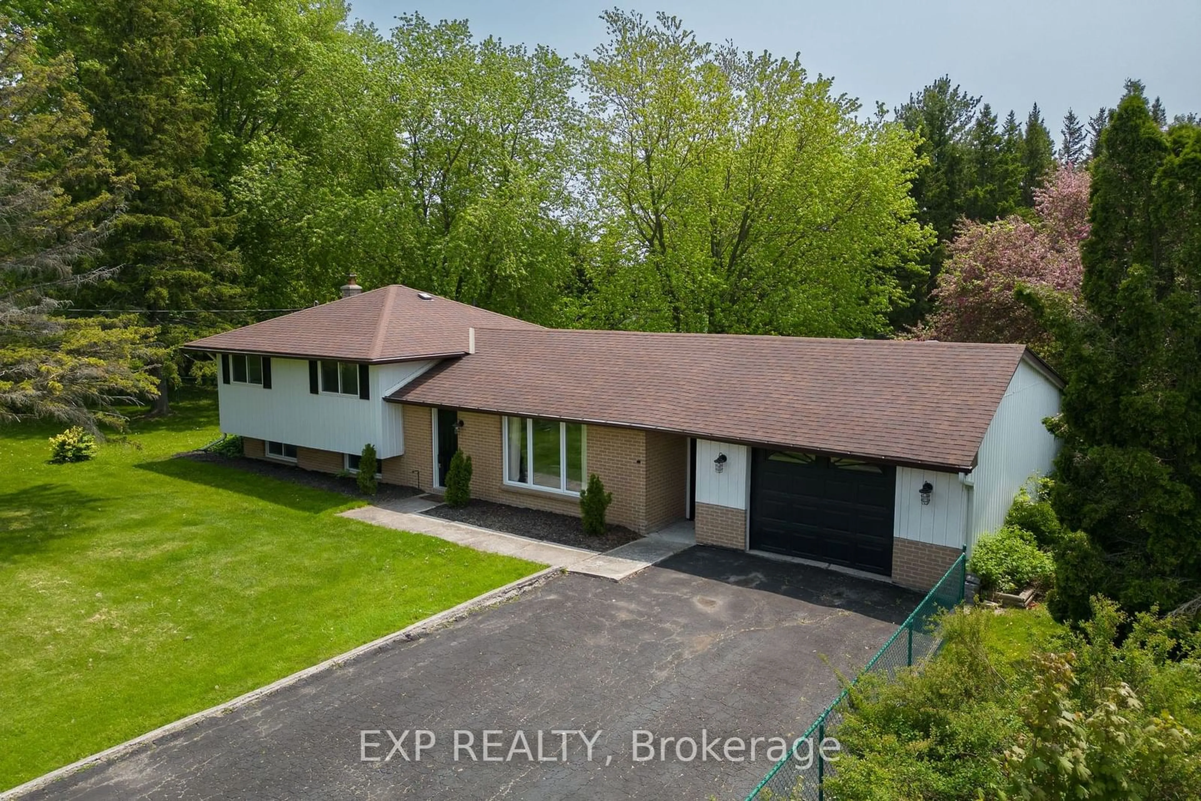 A pic from outside/outdoor area/front of a property/back of a property/a pic from drone, street for 13481 Loyalist Pkwy, Prince Edward County Ontario K0K 2T0