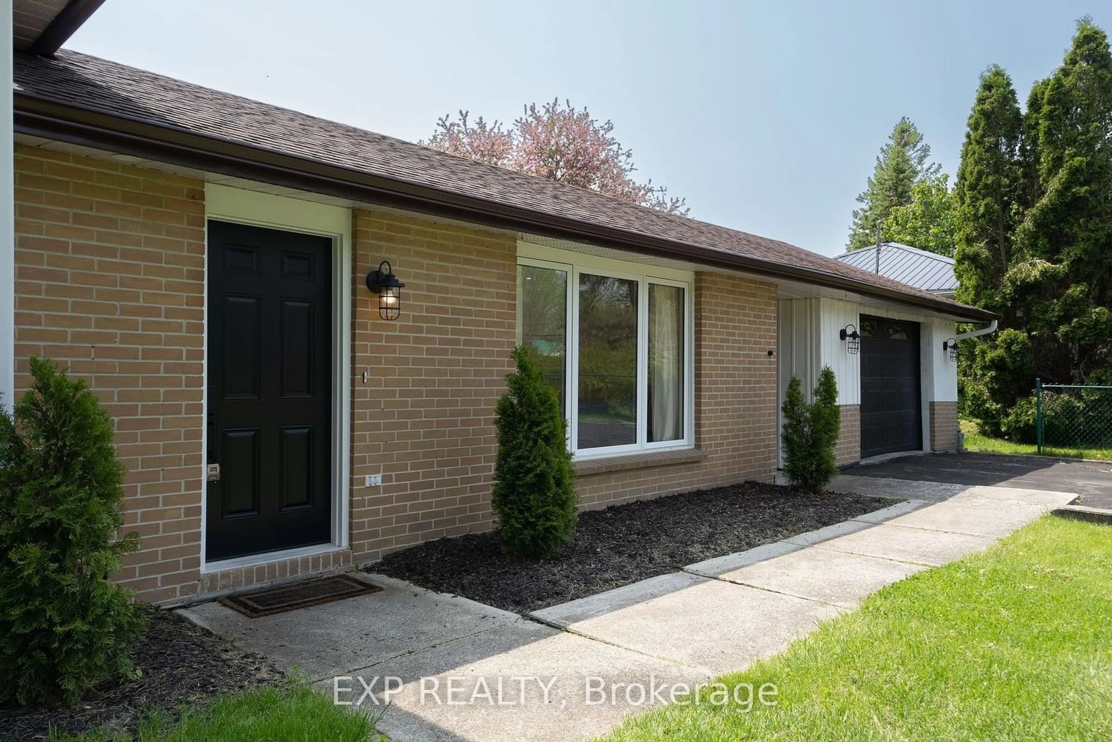 Home with brick exterior material, street for 13481 Loyalist Pkwy, Prince Edward County Ontario K0K 2T0