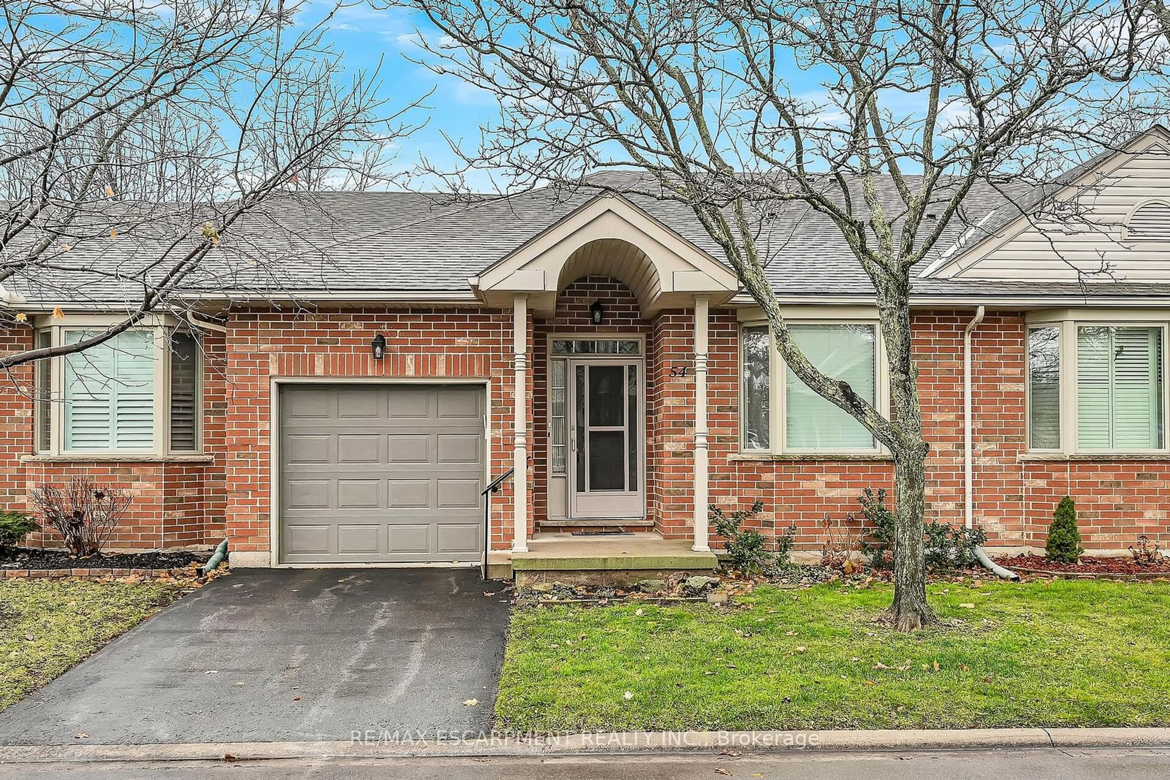 Home with brick exterior material, street for 54 Greentrail Dr, Hamilton Ontario L0R 1W0