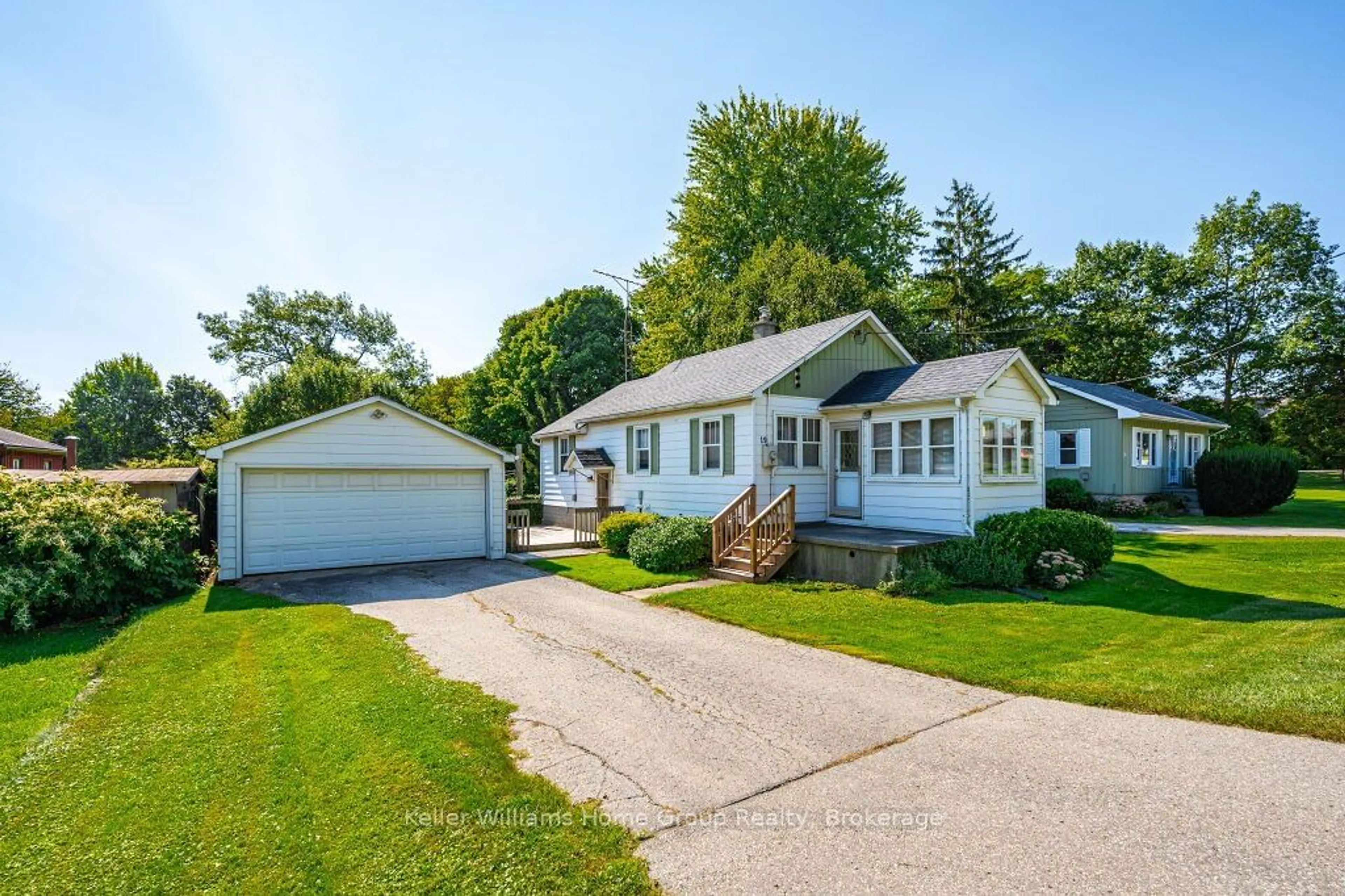 Home with vinyl exterior material, street for 19 Peel St, Mapleton Ontario N0B 1A0