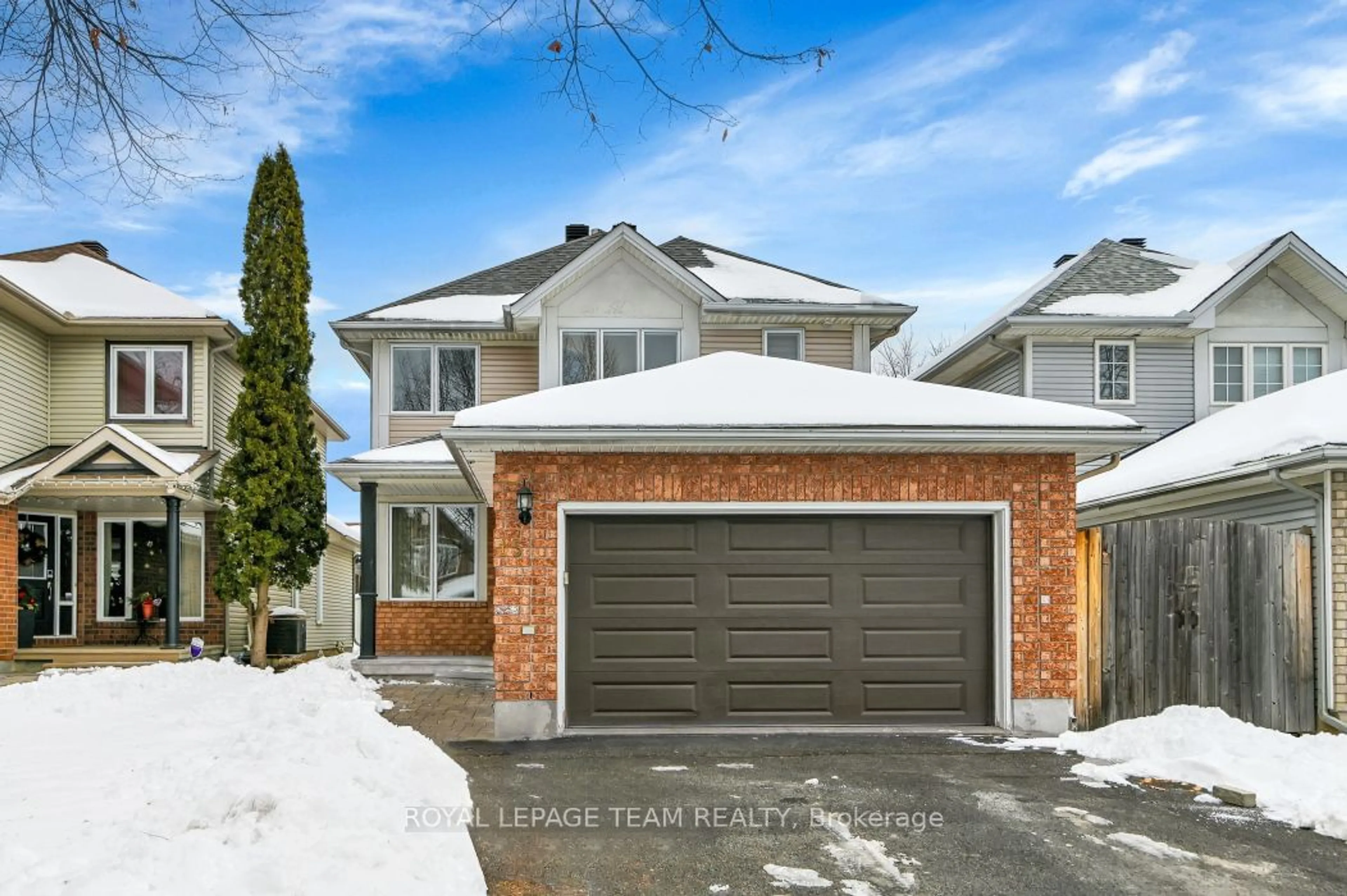 Home with brick exterior material, street for 15 Spur Ave, Kanata Ontario K2M 2B5