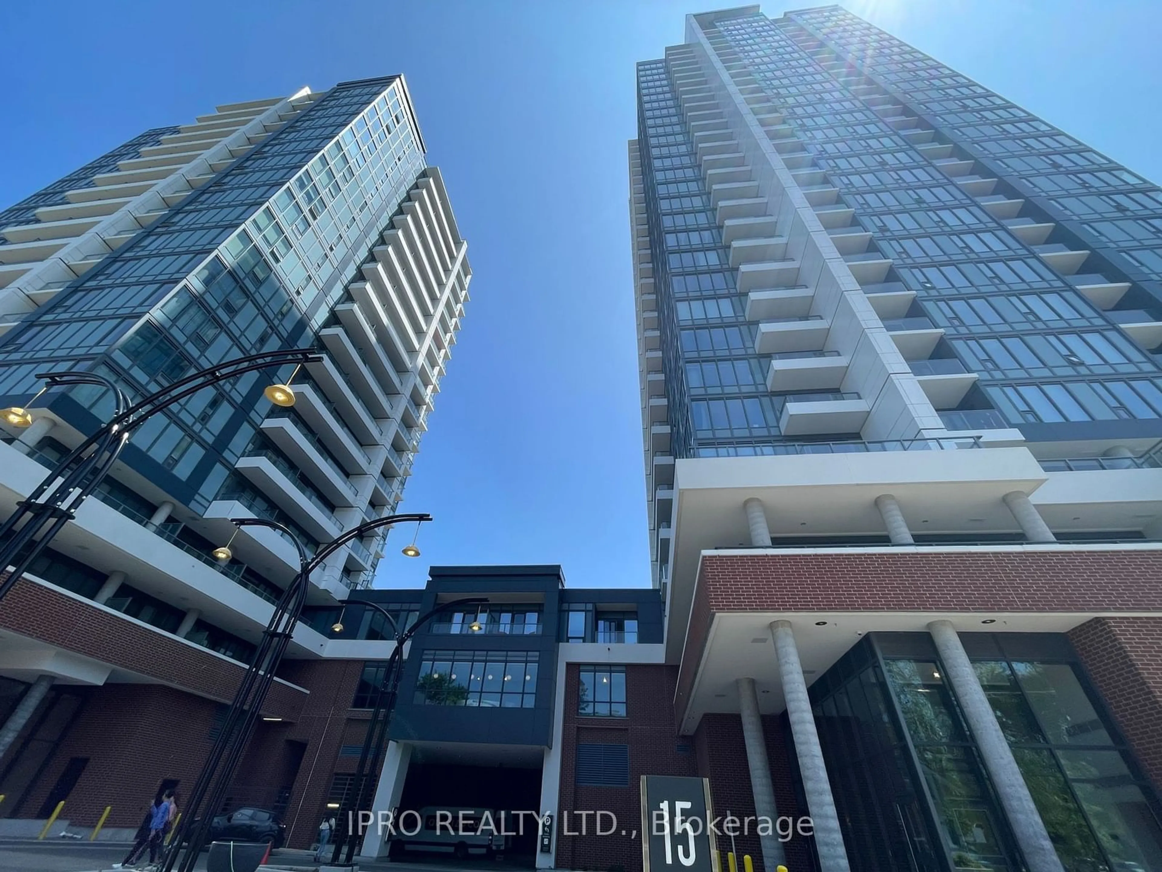 A pic from outside/outdoor area/front of a property/back of a property/a pic from drone, city buildings view from balcony for 15 Wellington St #211, Kitchener Ontario N2G 0E4