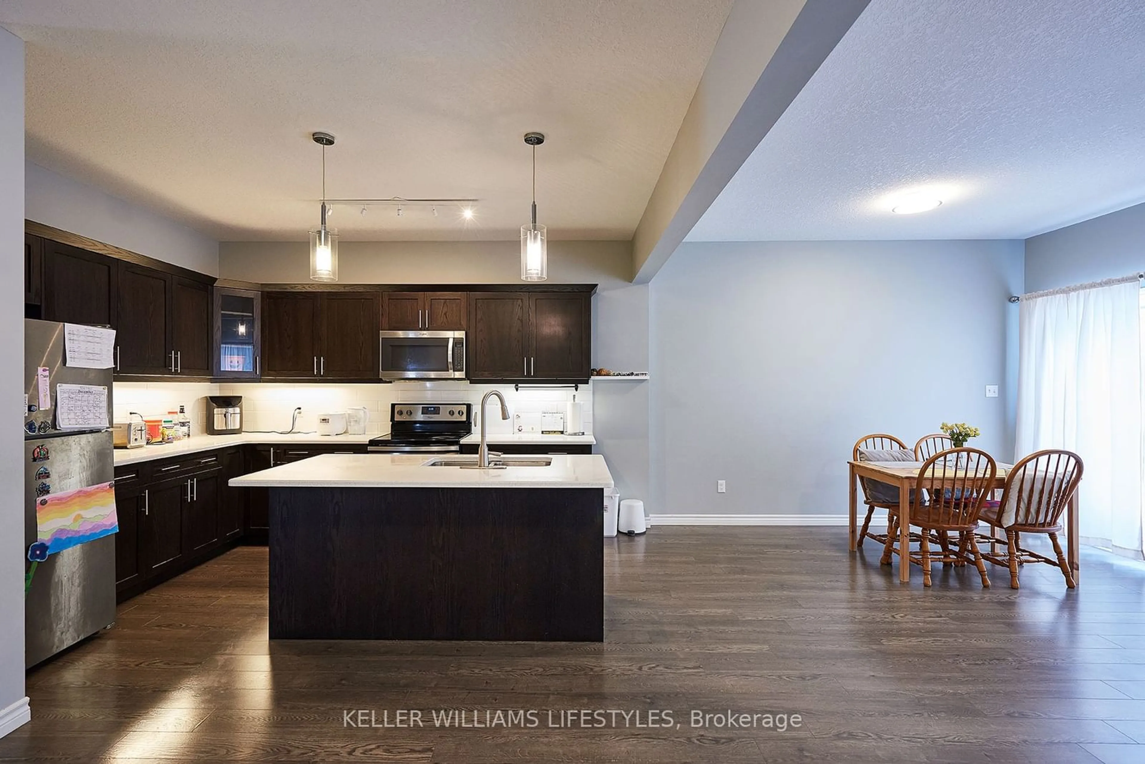 Open concept kitchen, ceramic/tile floor for 1924 CEDARHOLLOW Blvd #83, London Ontario N5X 0K3