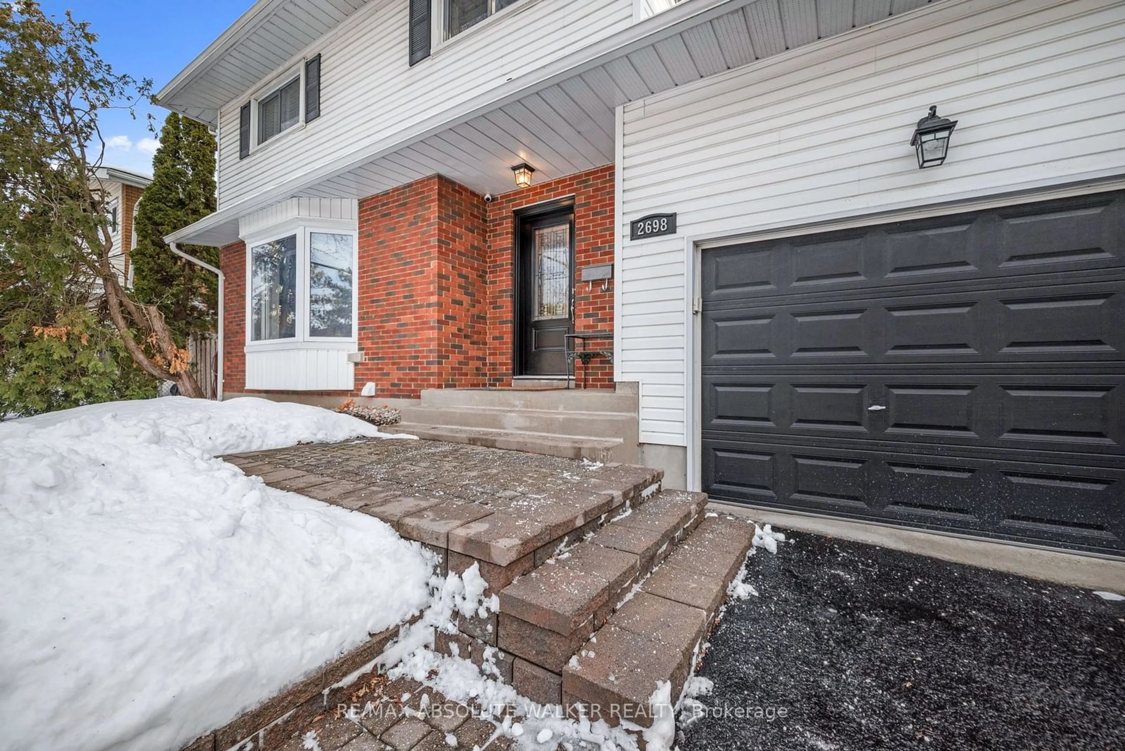 Home with brick exterior material, street for 2698 Iris St, Parkway Park - Queensway Terrace S and Area Ontario K2C 1E6