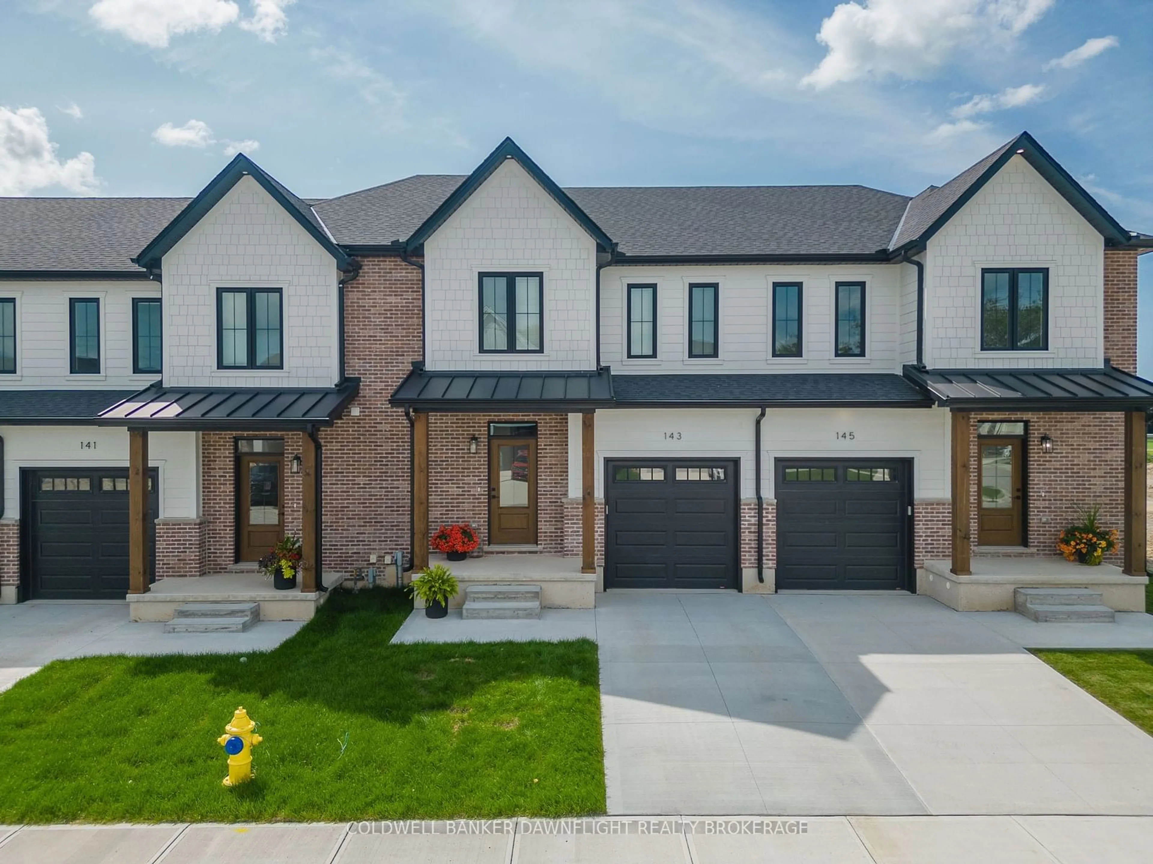 Home with brick exterior material, street for 147 SCOTTS Dr #28, Lucan Biddulph Ontario N0M 2J0