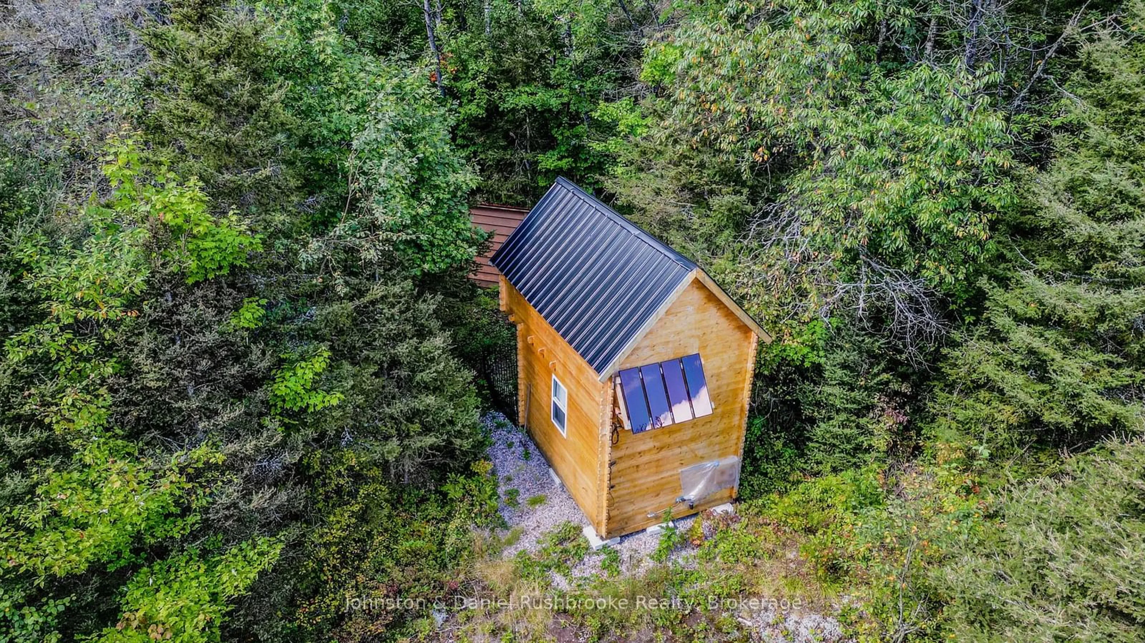 A pic from outside/outdoor area/front of a property/back of a property/a pic from drone, building for 77 GRINDSTONE Rd, Magnetawan Ontario P0A 1Z0