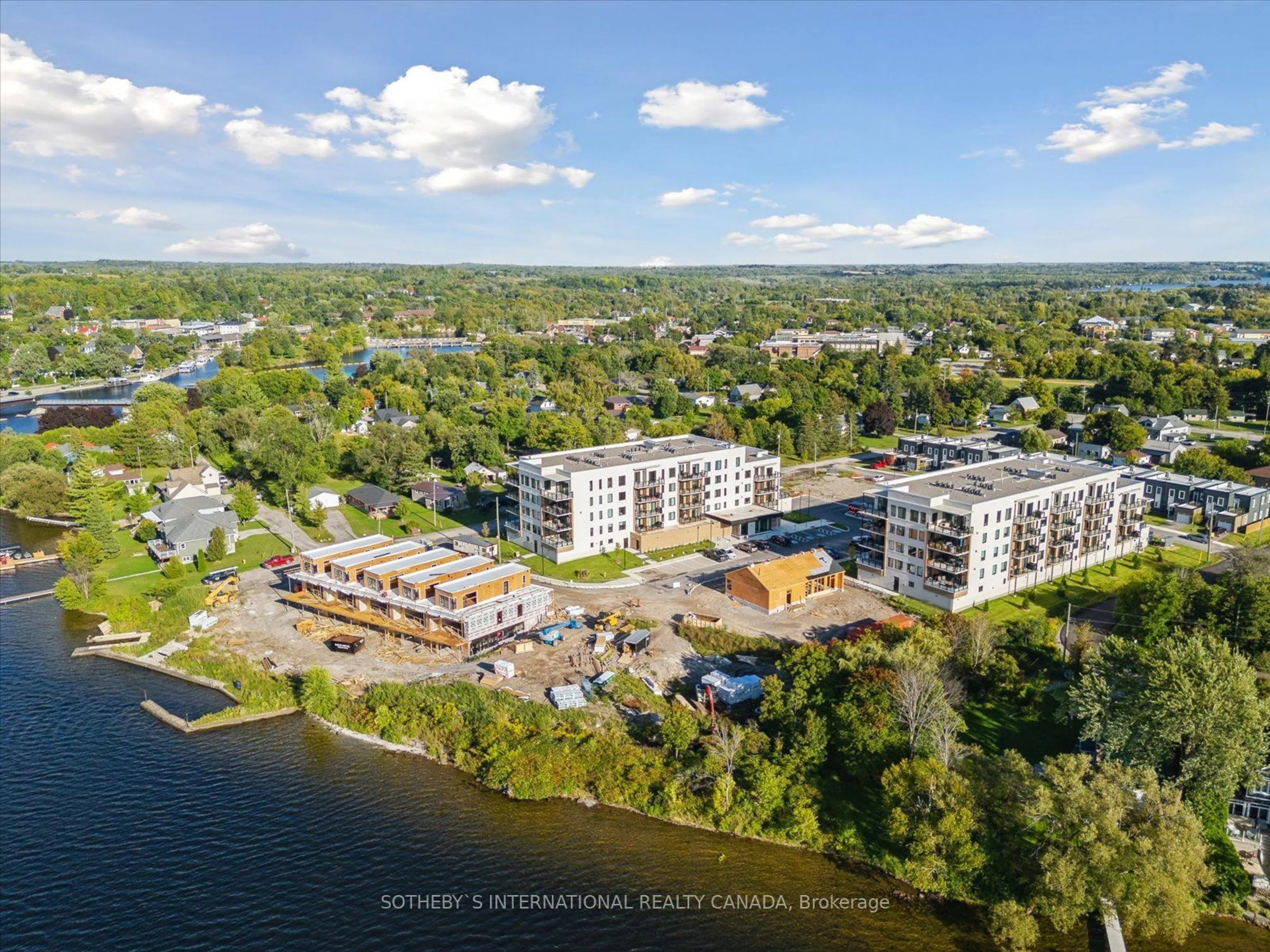 A pic from outside/outdoor area/front of a property/back of a property/a pic from drone, water/lake/river/ocean view for 19B West St #208, Kawartha Lakes Ontario K0M 1N0