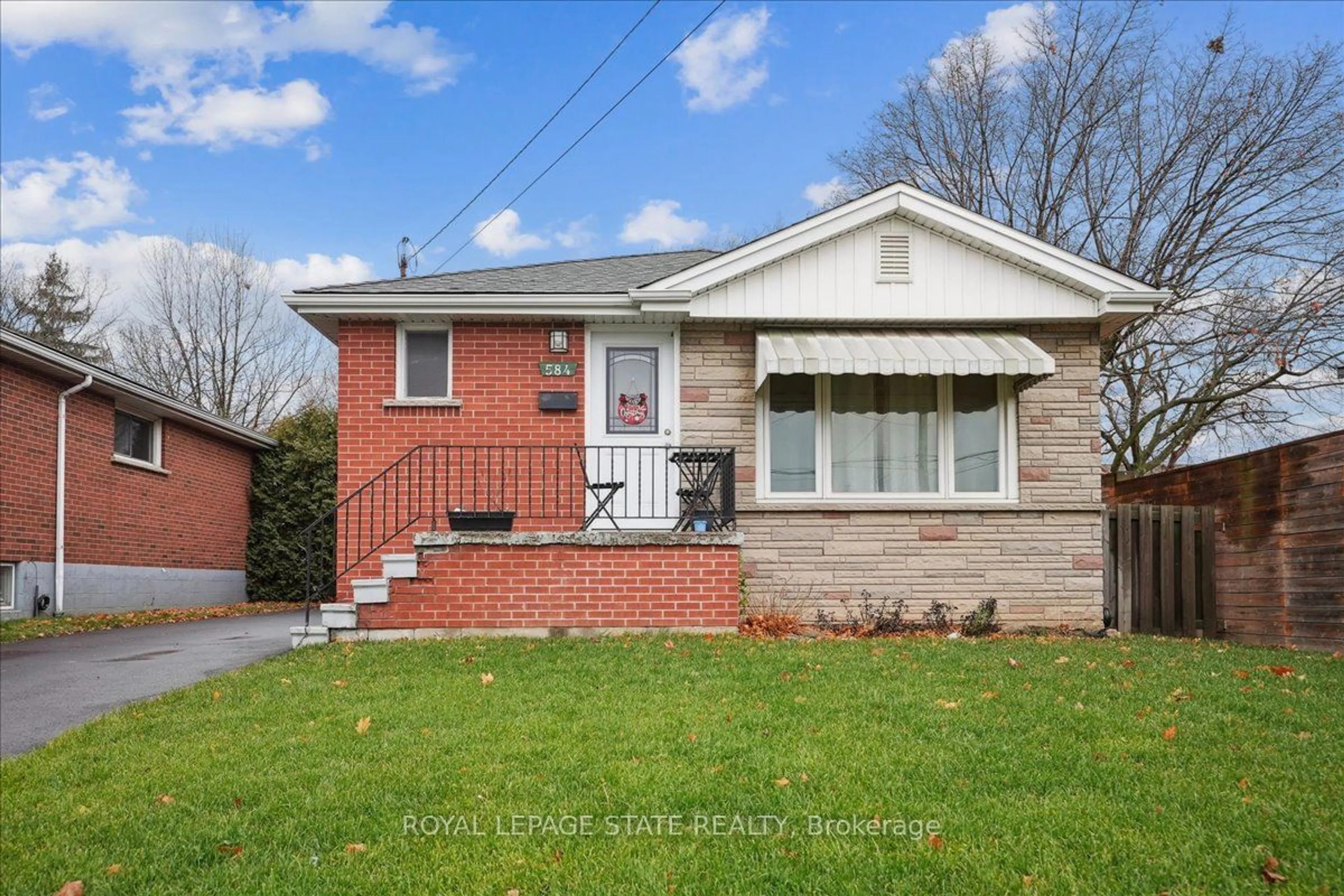 Home with brick exterior material, street for 584 East 27th St, Hamilton Ontario L8V 3H6