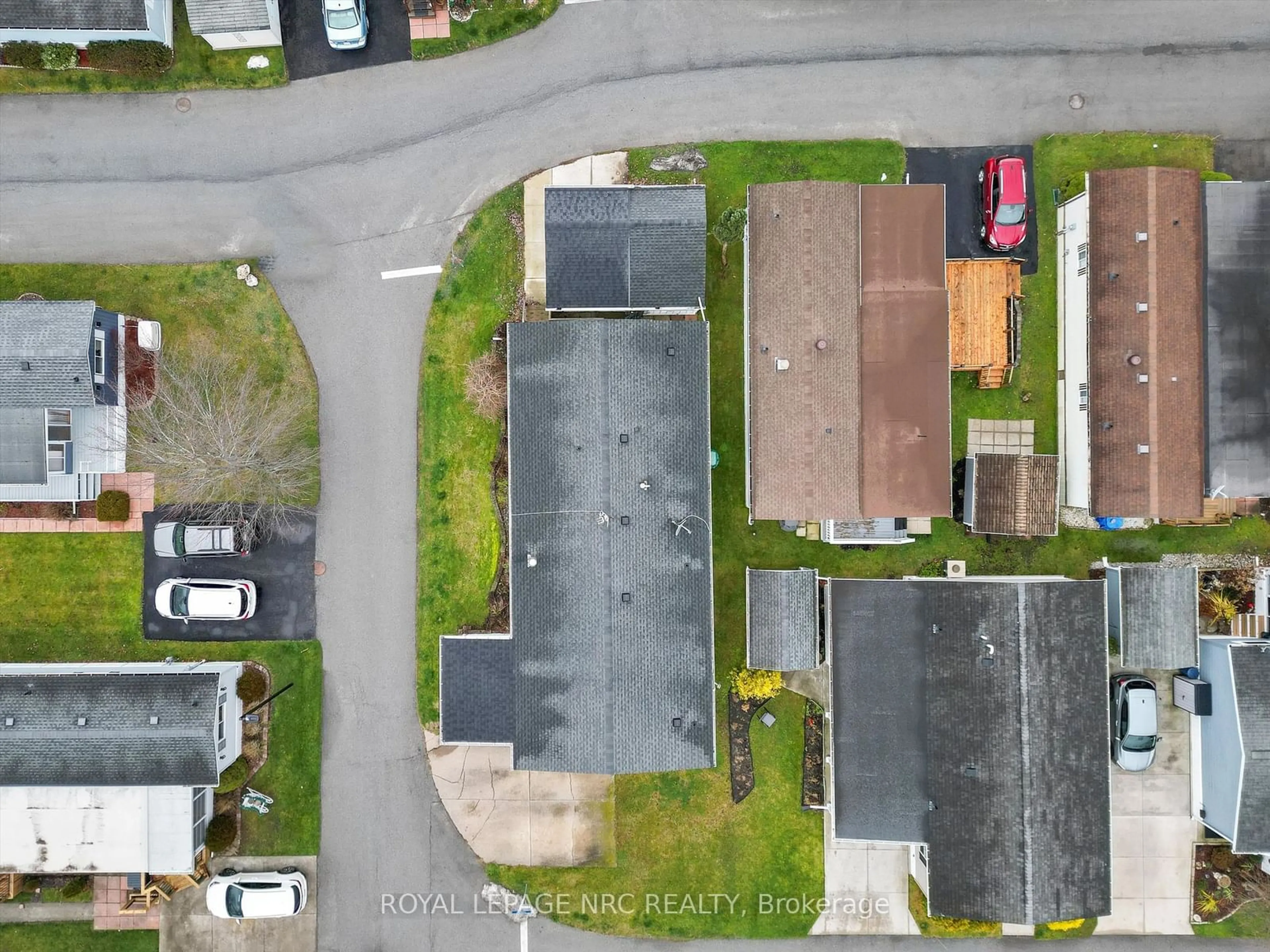 A pic from outside/outdoor area/front of a property/back of a property/a pic from drone, street for 3033 Townline Rd ##248, Fort Erie Ontario L0S 1S1