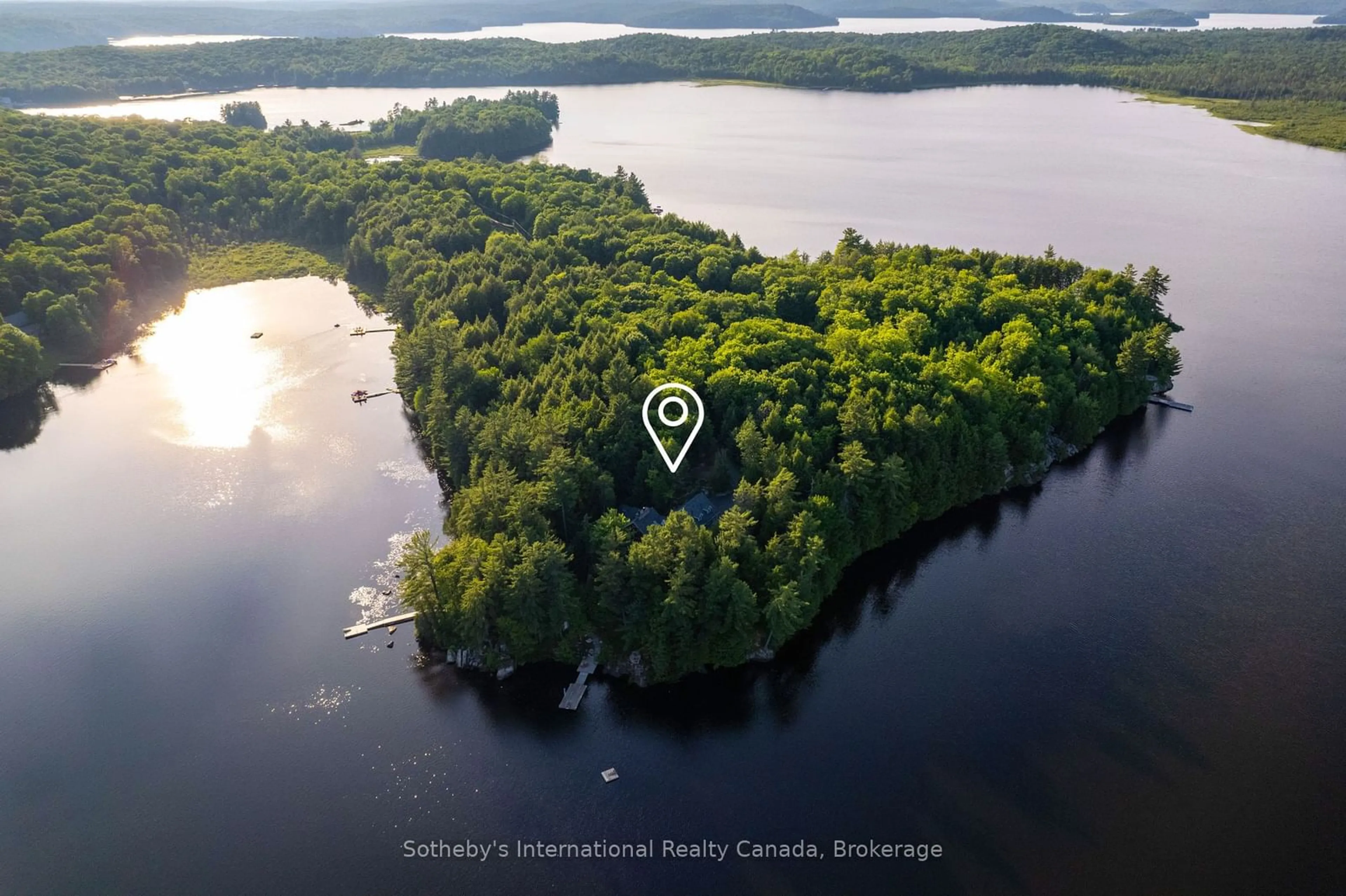 A pic from outside/outdoor area/front of a property/back of a property/a pic from drone, water/lake/river/ocean view for 1042 Truscott Pl, Lake of Bays Ontario P0B 1A0