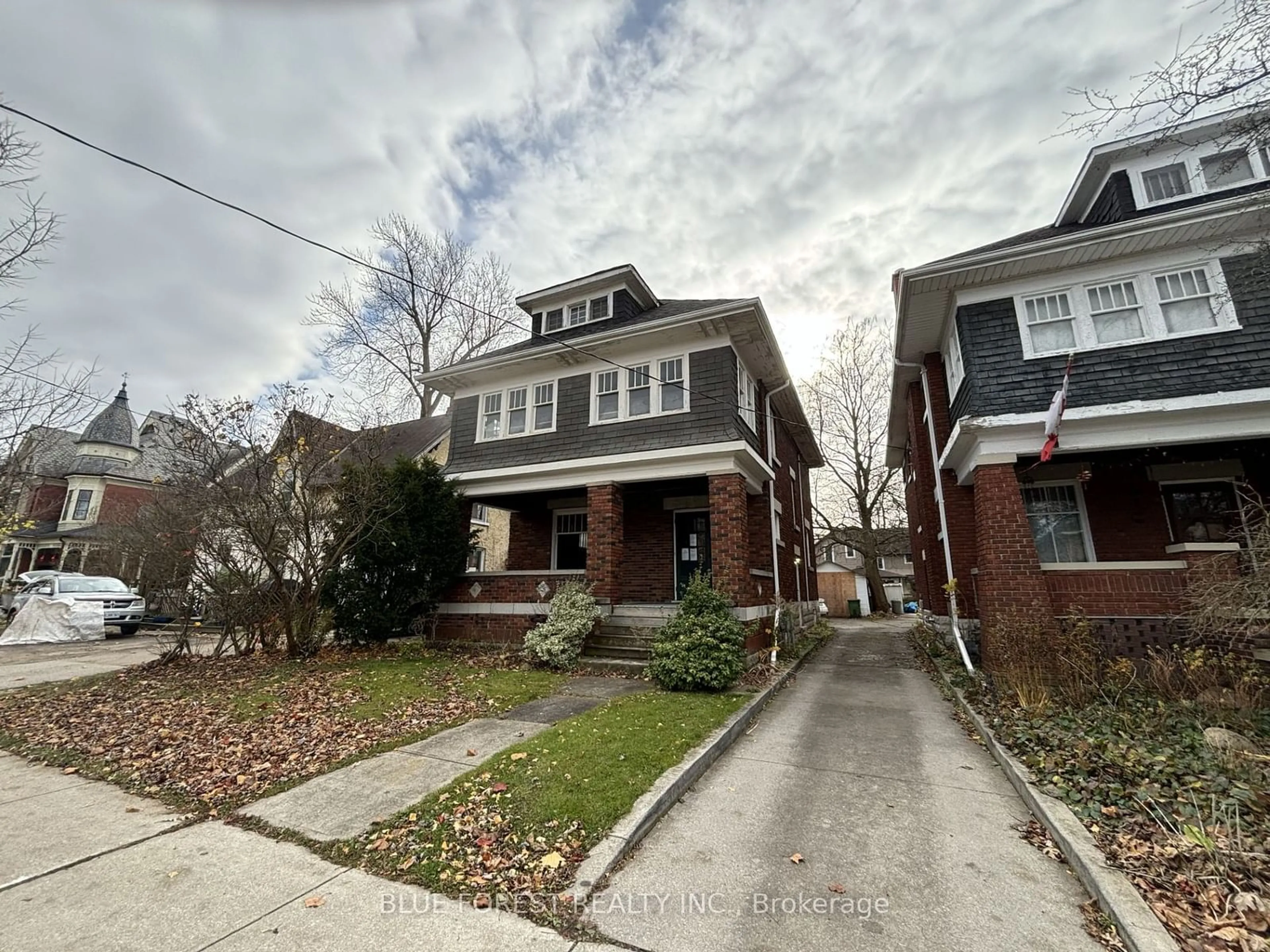 Home with brick exterior material, street for 94 Wellington St, St. Thomas Ontario N5R 2R2