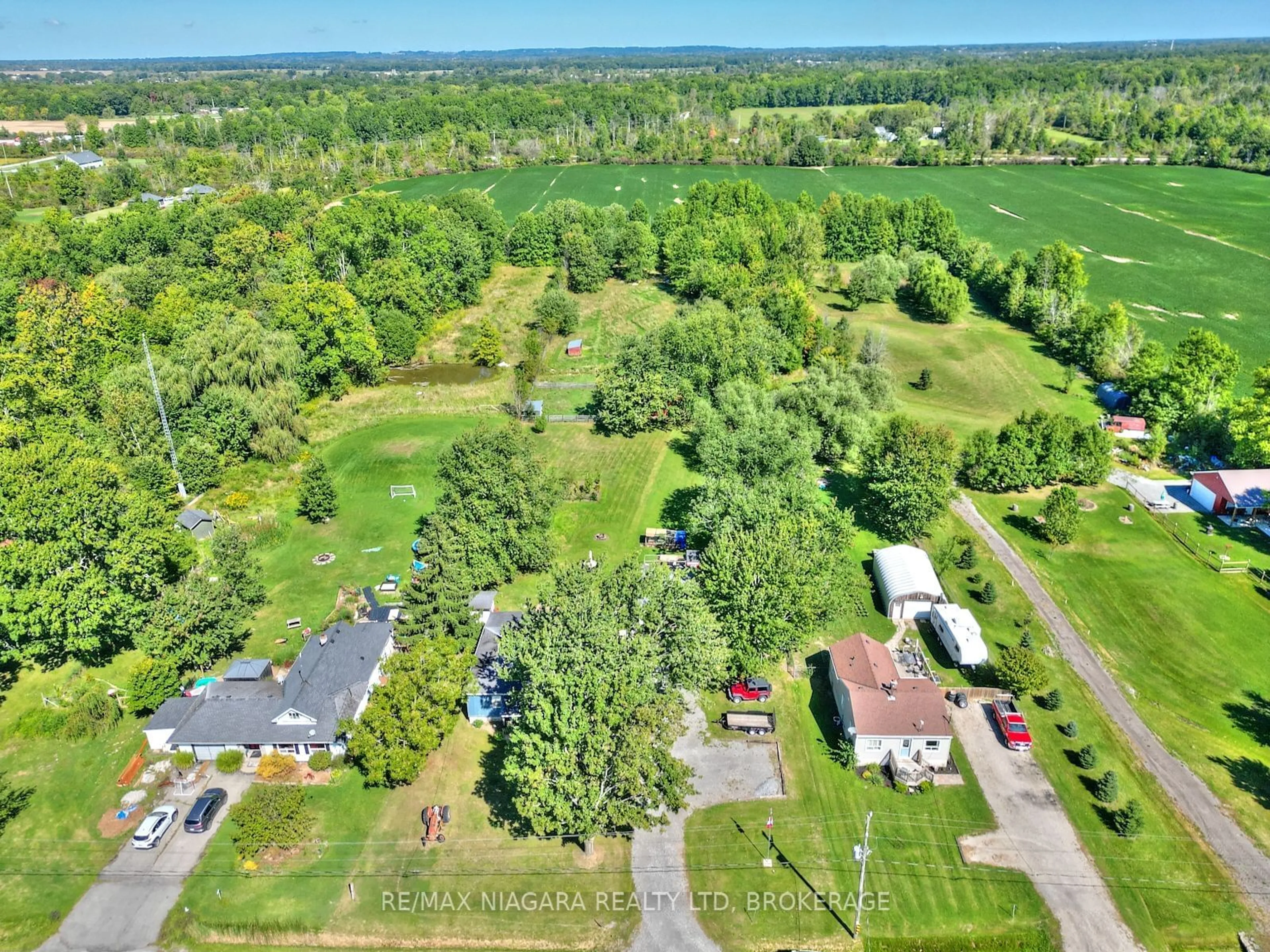 A pic from outside/outdoor area/front of a property/back of a property/a pic from drone, forest/trees view for 40252 FORKS Rd, Wainfleet Ontario L0S 1V0