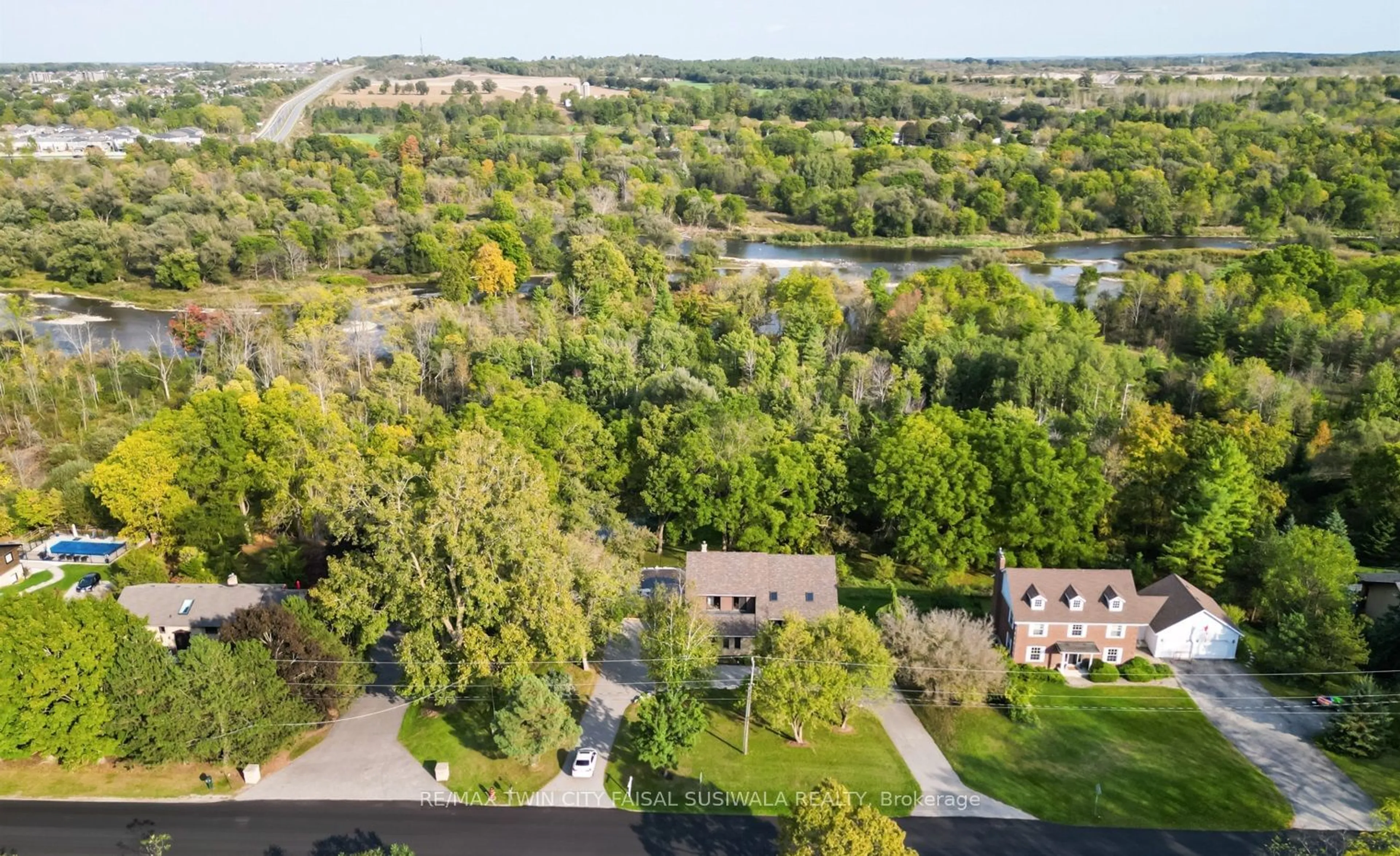 A pic from outside/outdoor area/front of a property/back of a property/a pic from drone, water/lake/river/ocean view for 1031 West River Rd, Cambridge Ontario N1R 5S5