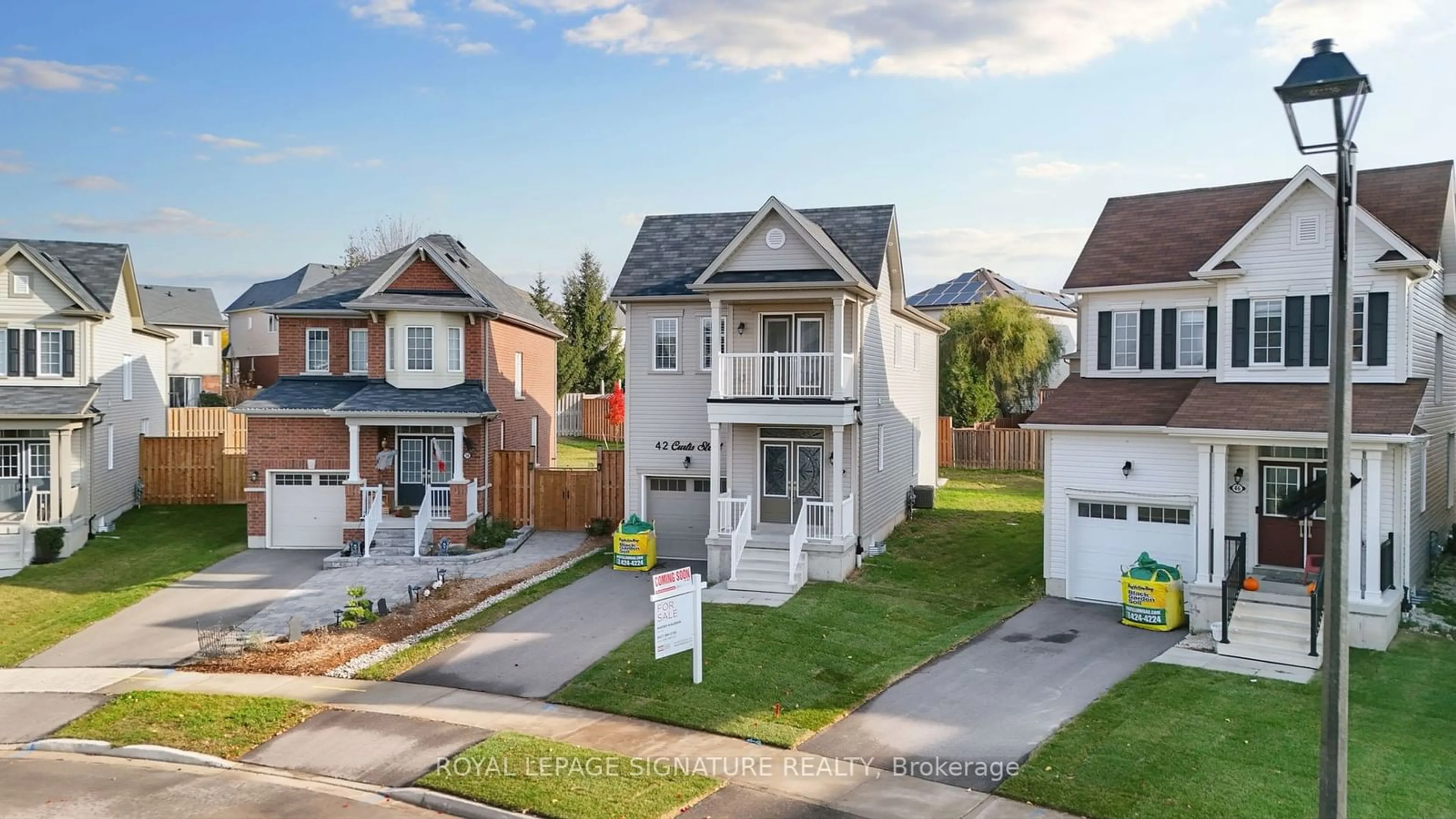 Home with brick exterior material, street for 42 Curtis St, Woolwich Ontario N0B 1M0