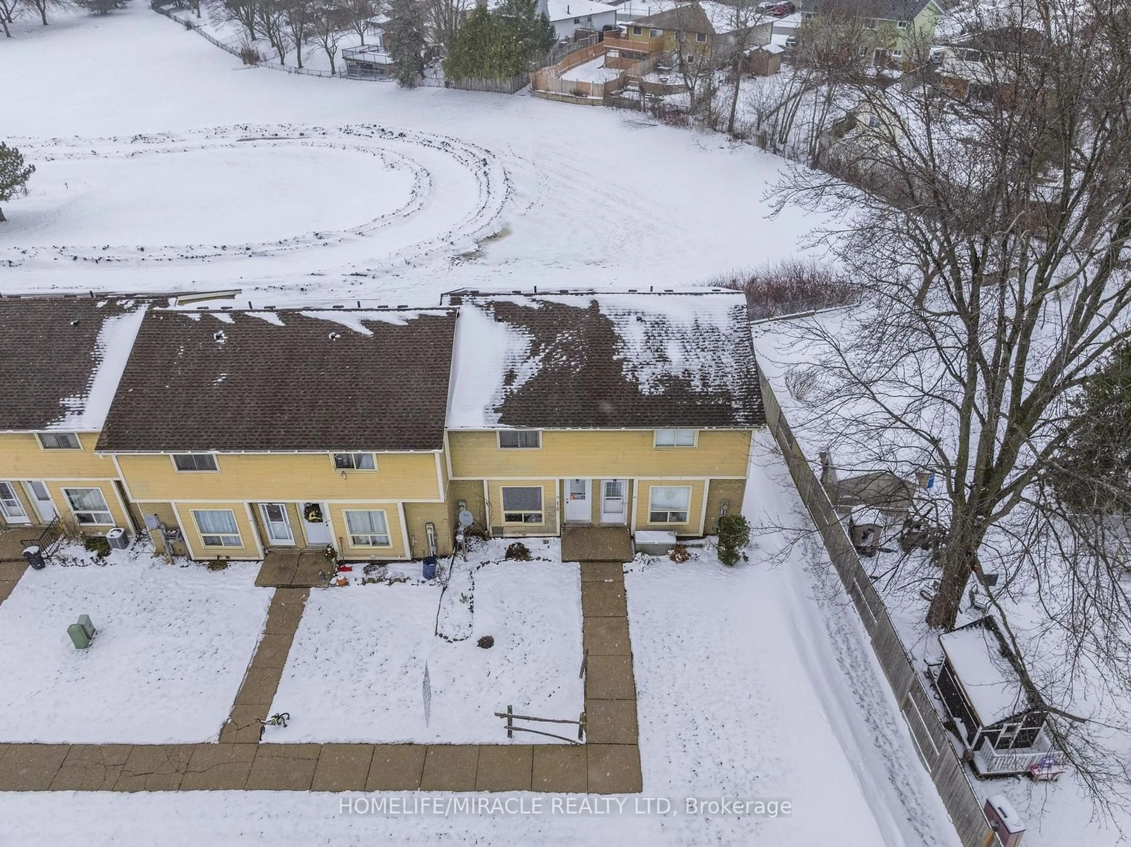 A pic from outside/outdoor area/front of a property/back of a property/a pic from drone, street for 875 Parkinson Rd #22, Woodstock Ontario N4S 8S7