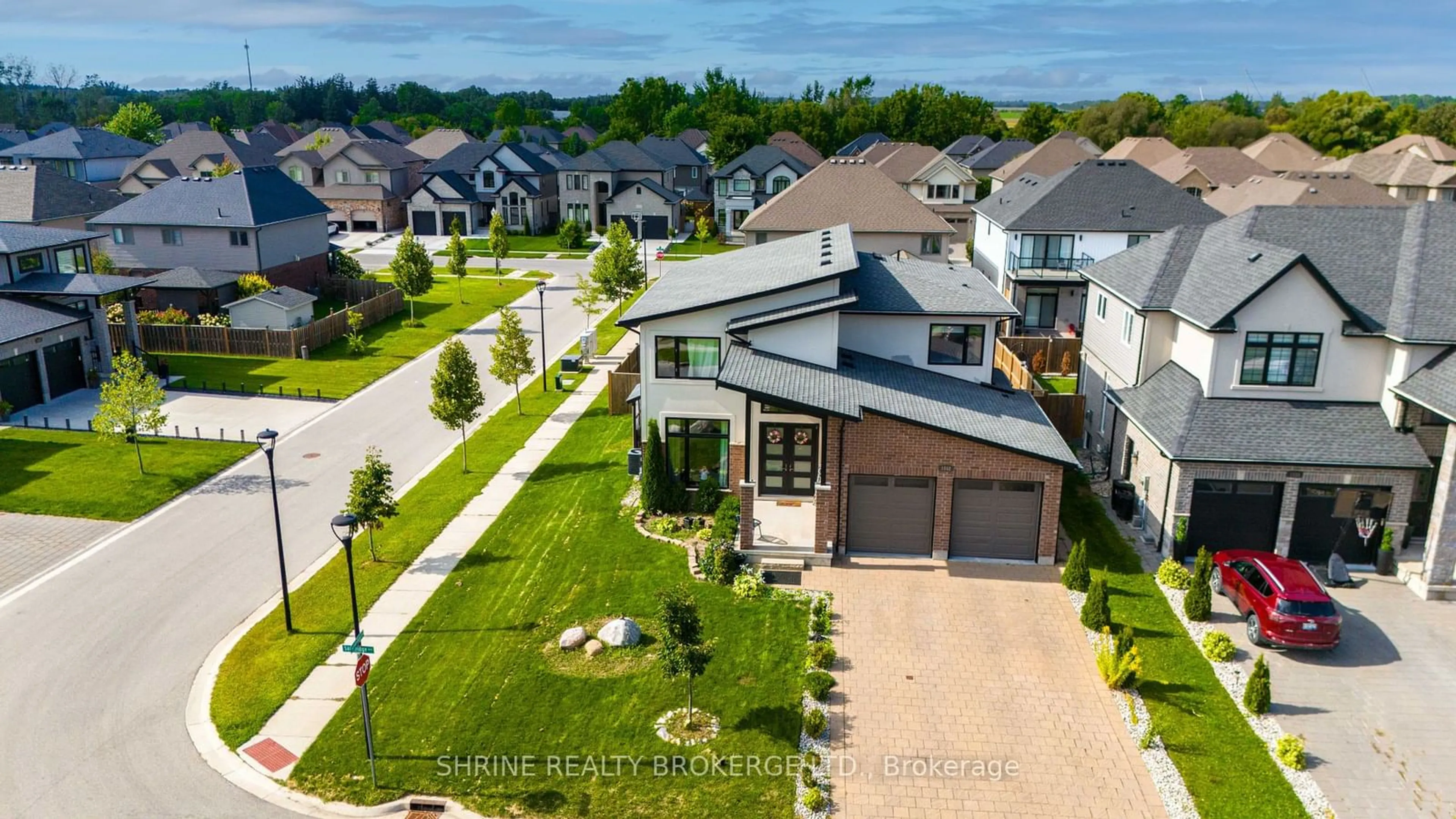 A pic from outside/outdoor area/front of a property/back of a property/a pic from drone, water/lake/river/ocean view for 1552 Sandridge Ave, London Ontario N5X 0G5