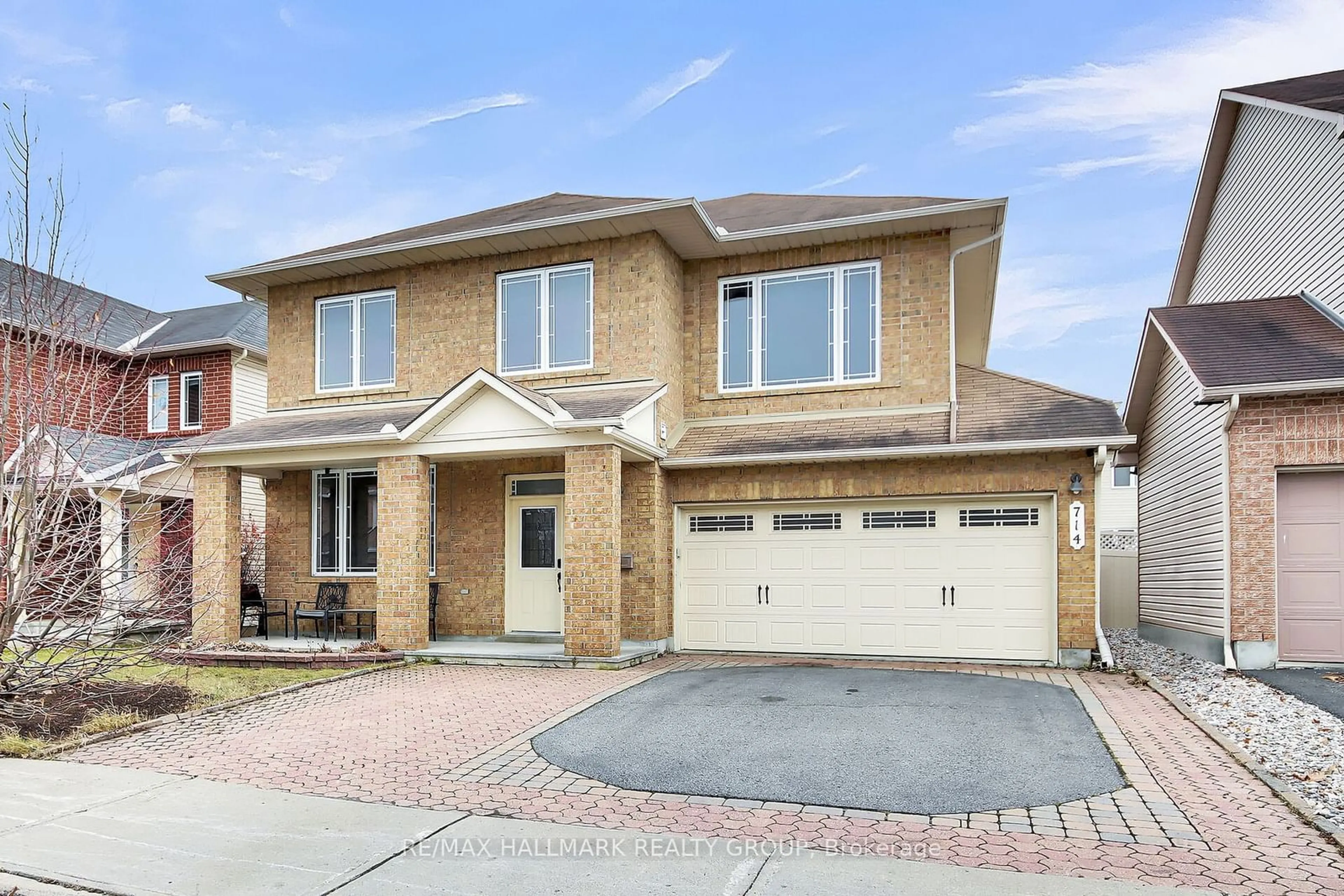 Home with brick exterior material, street for 714 Clearbrook Dr, Barrhaven Ontario K2J 5P1