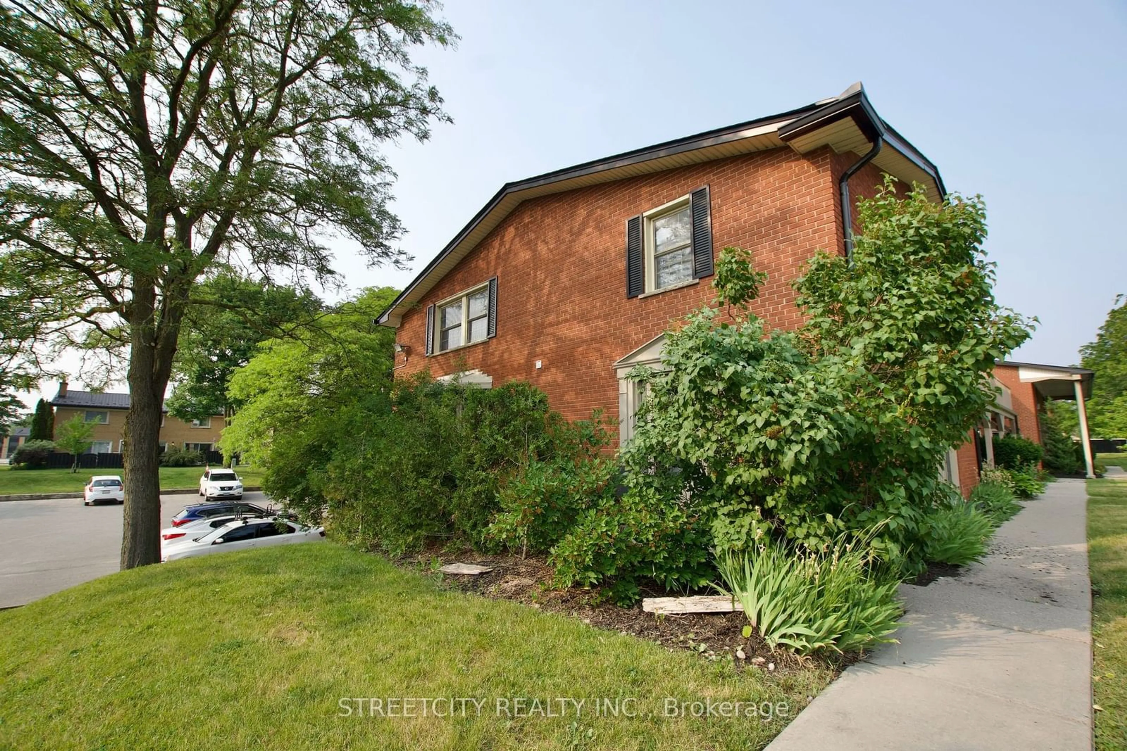 Home with brick exterior material, street for 1105 Oxford St, London Ontario N6H 1V6