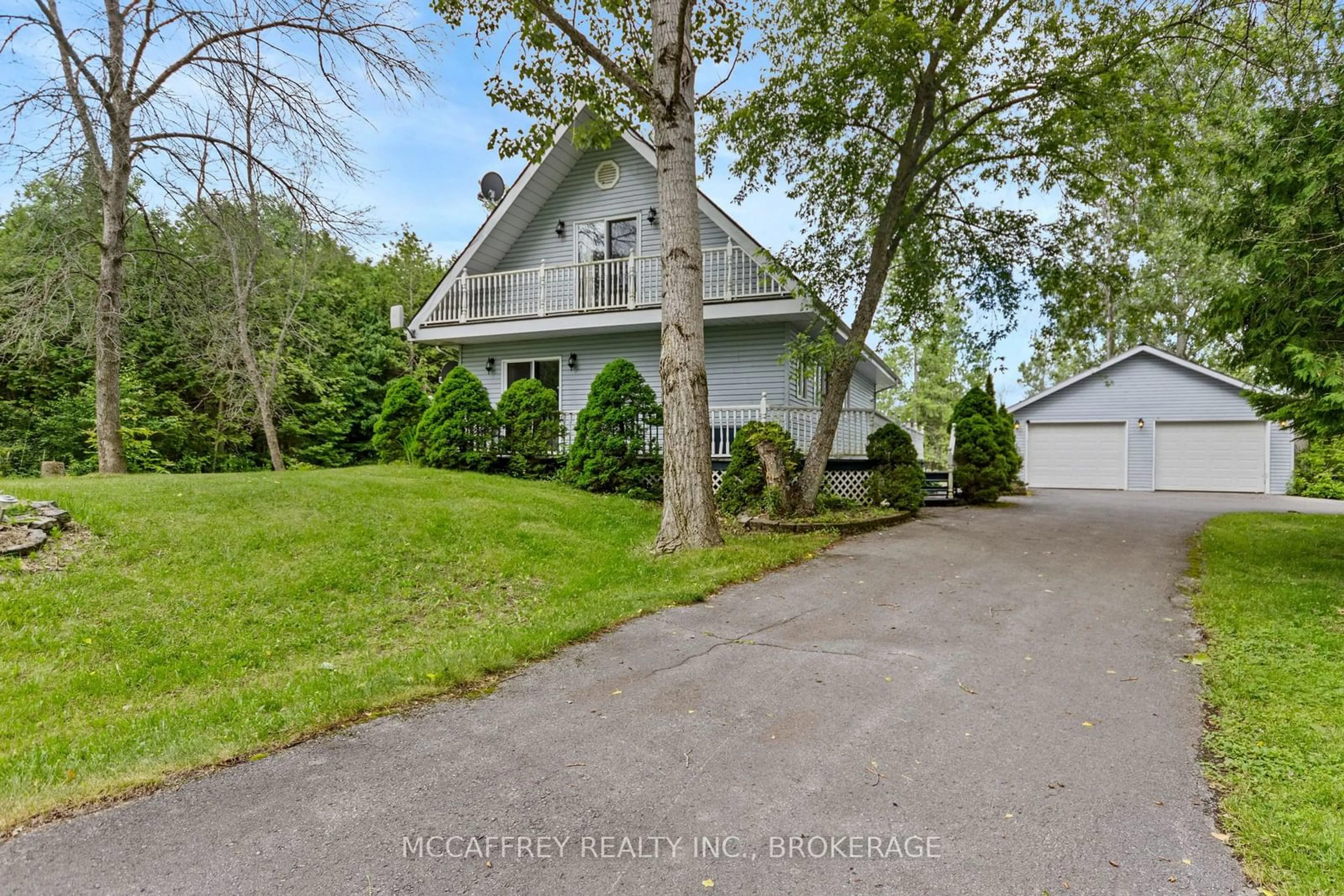 A pic from outside/outdoor area/front of a property/back of a property/a pic from drone, street for 535 BEECHWOOD Rd, Greater Napanee Ontario K7R 3L1