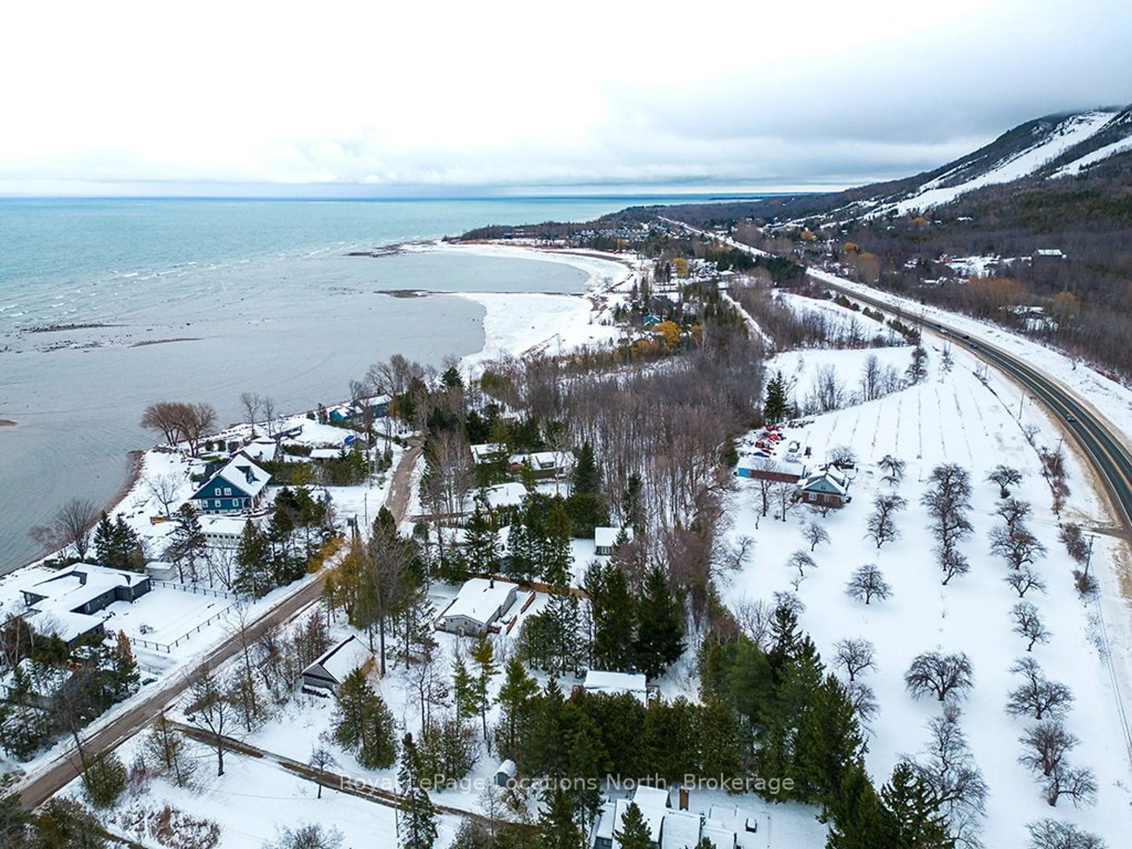 A pic from outside/outdoor area/front of a property/back of a property/a pic from drone, water/lake/river/ocean view for 128 TESKEY Dr, Blue Mountains Ontario N0H 1J0