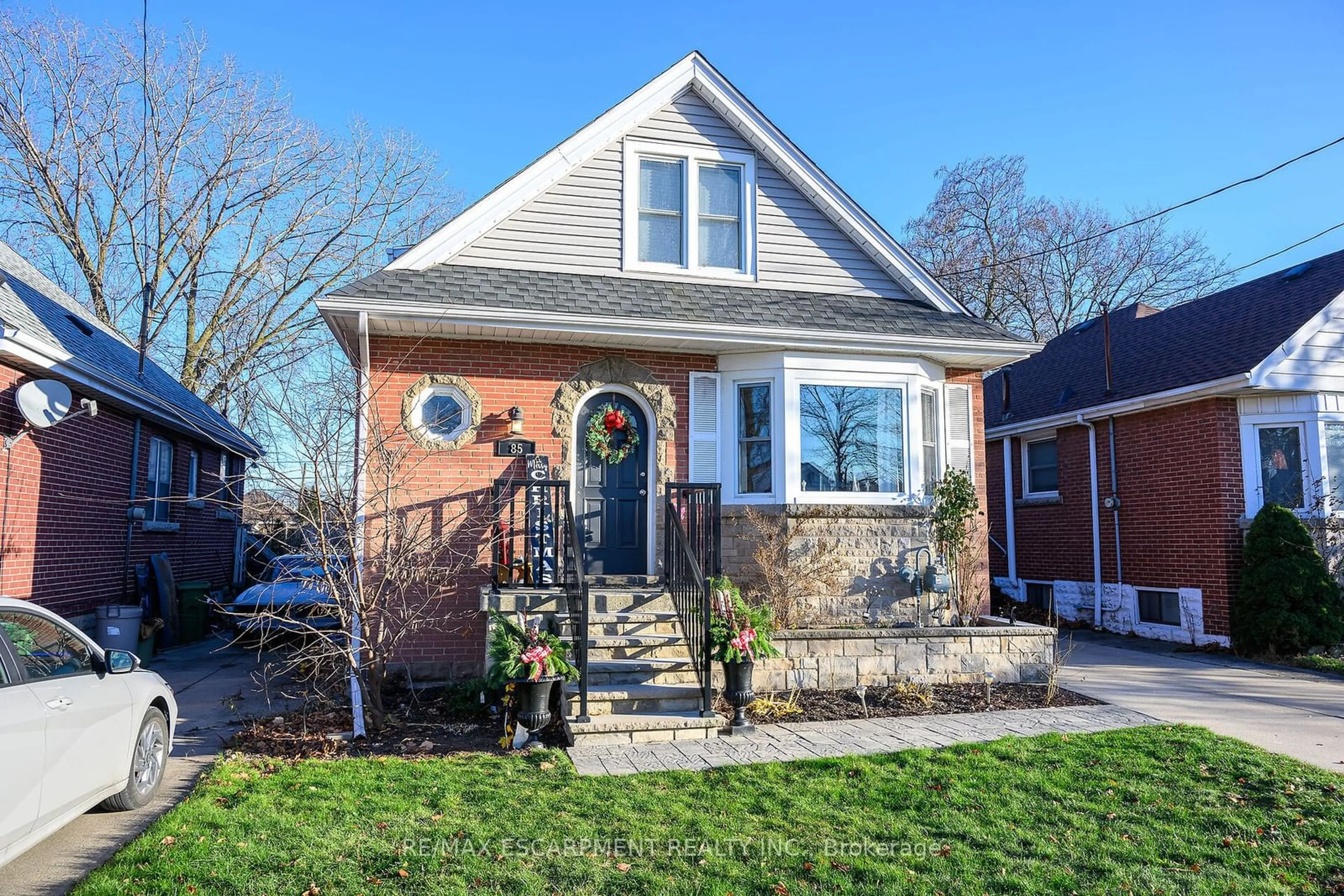 Home with brick exterior material, street for 85 Barons Ave, Hamilton Ontario L8K 2Y4