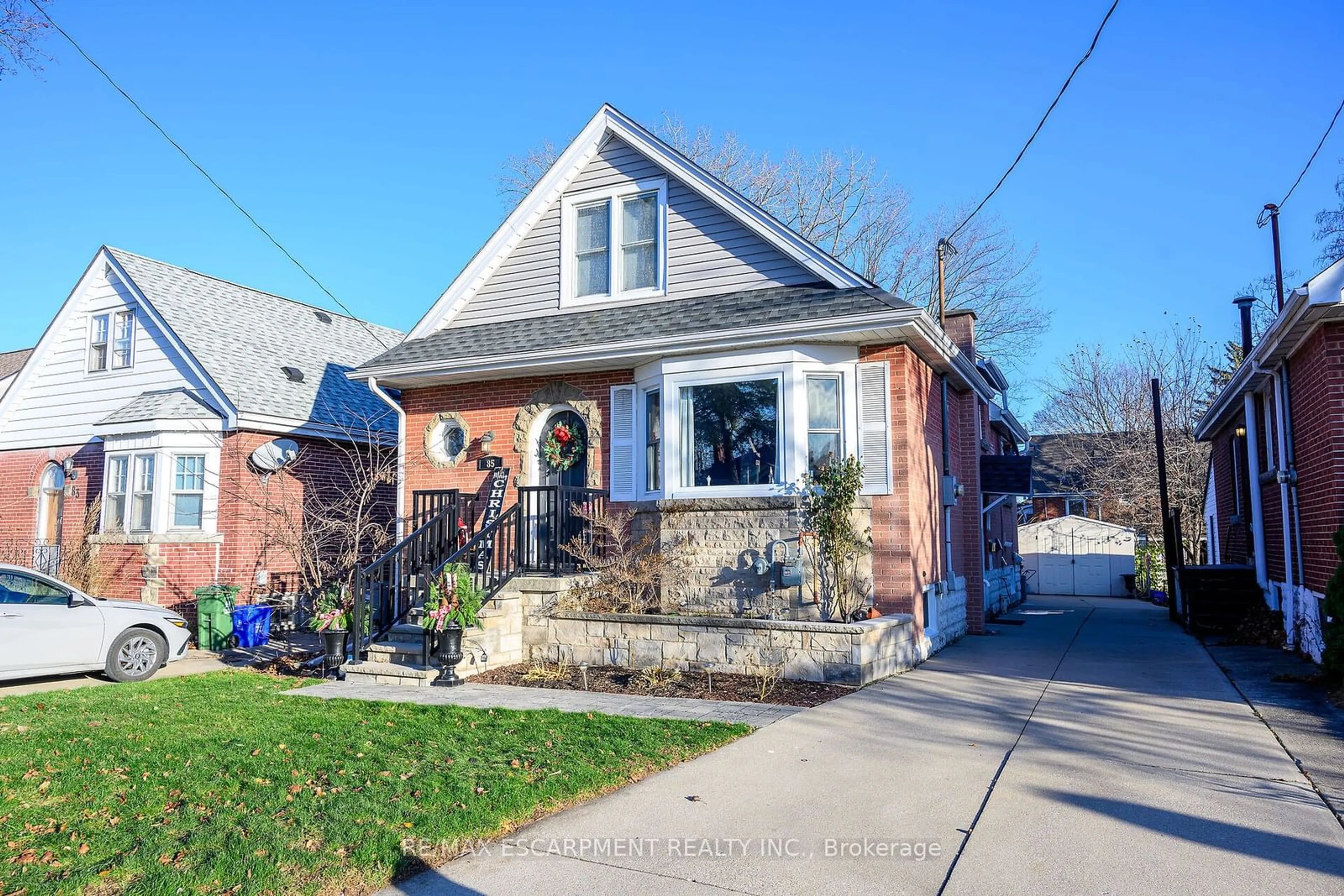 Home with brick exterior material, street for 85 Barons Ave, Hamilton Ontario L8K 2Y4