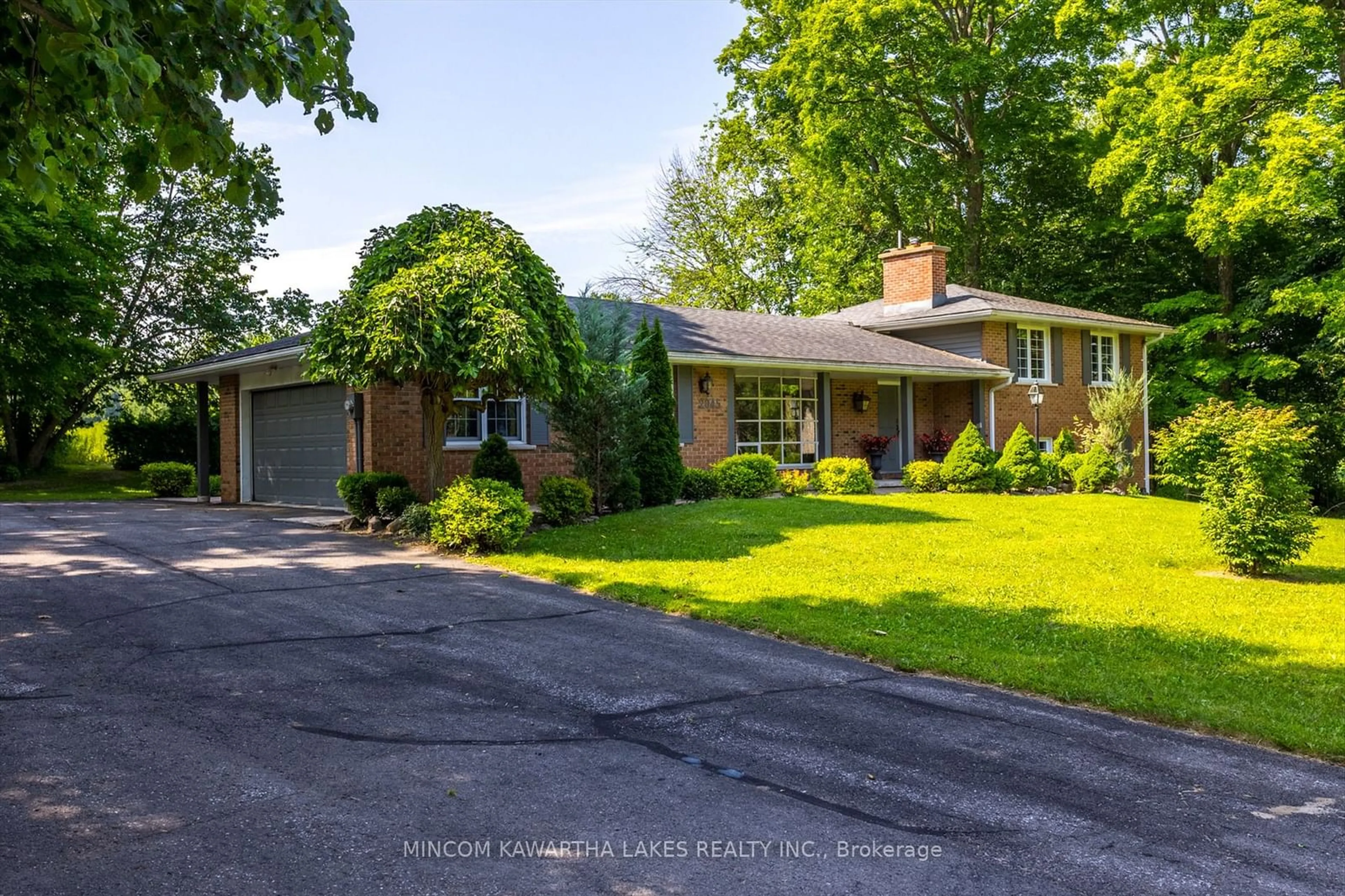 Home with brick exterior material, street for 2045 Sherbrooke St, Cavan Monaghan Ontario K9J 6X4