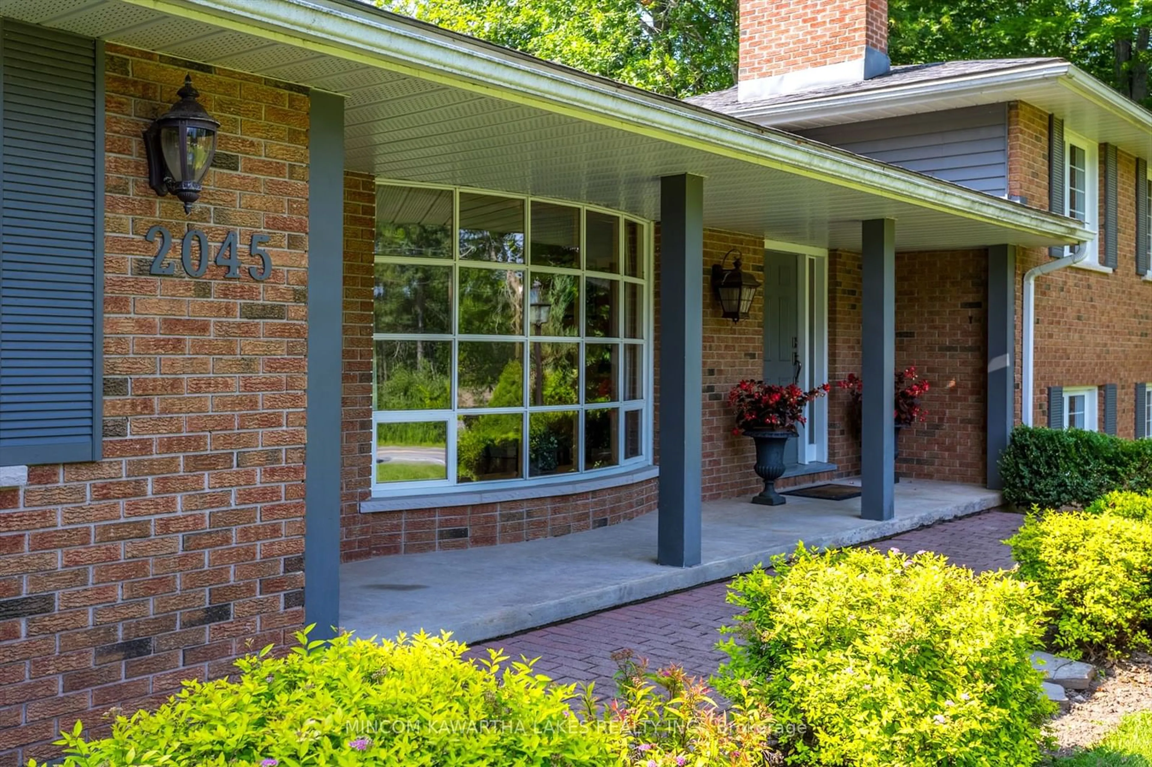 Home with brick exterior material, street for 2045 Sherbrooke St, Cavan Monaghan Ontario K9J 6X4