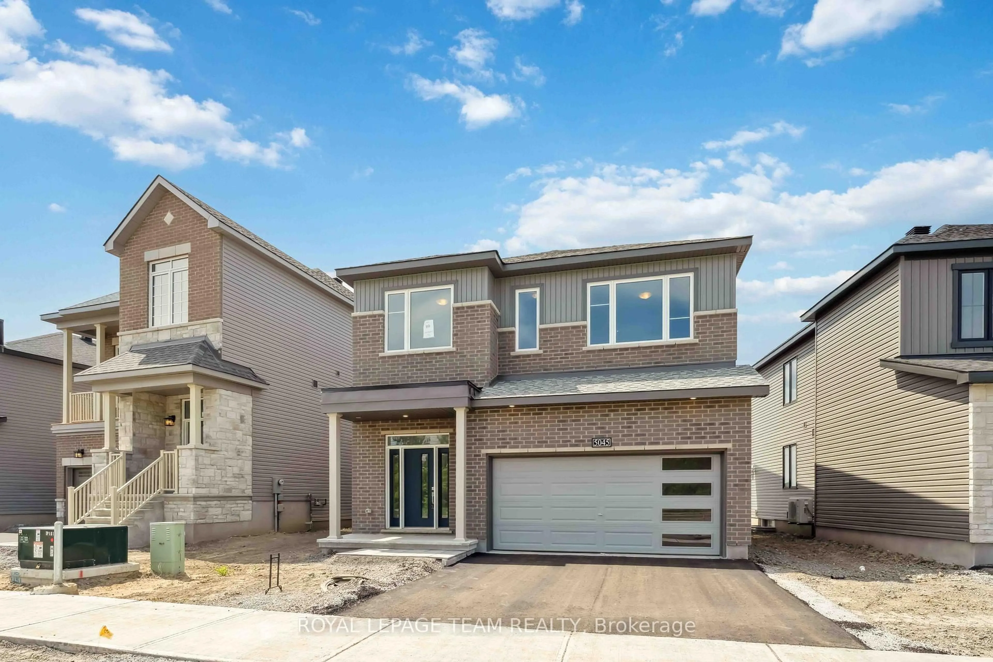 Home with vinyl exterior material, street for 5045 Abbott St, Kanata Ontario K2V 0V2