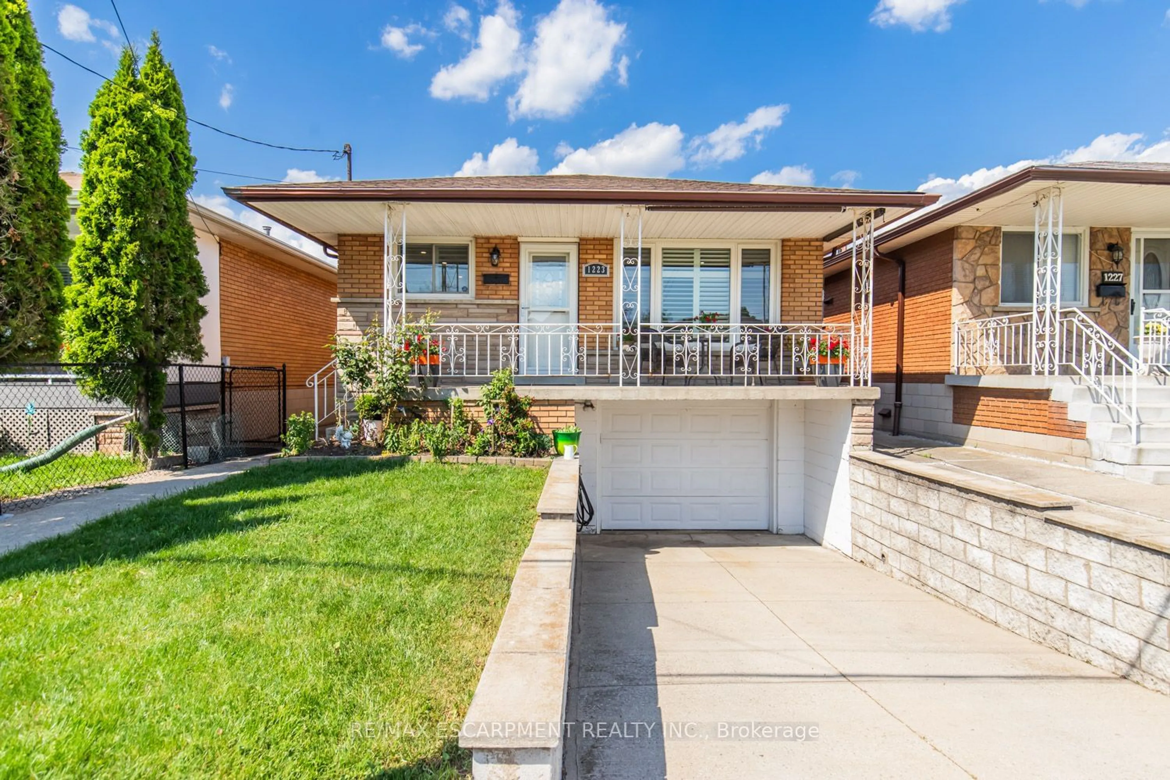 Home with brick exterior material, street for 1223 Dunsmure Rd, Hamilton Ontario L8H 1L5