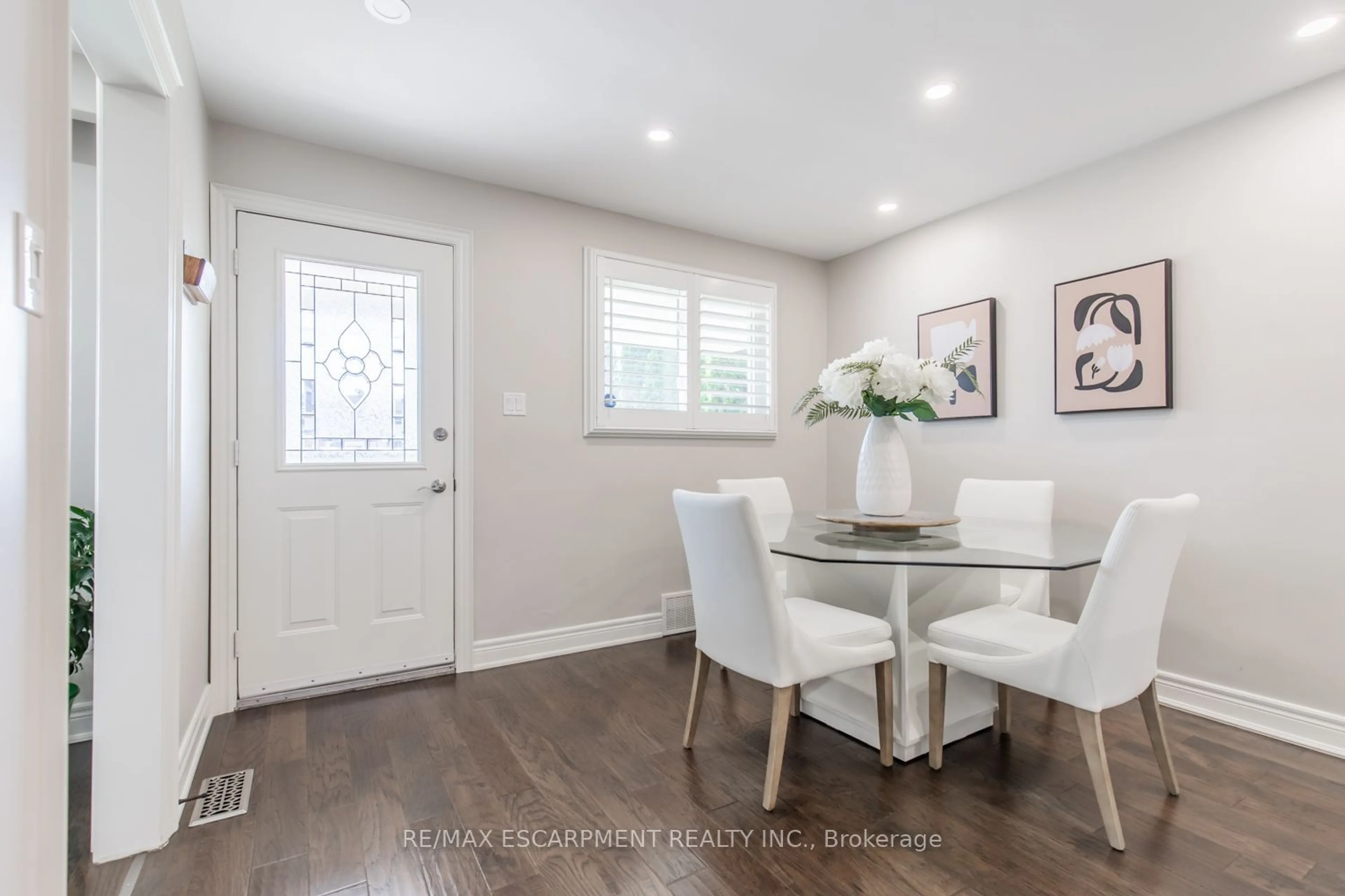 Dining room, wood/laminate floor for 1223 Dunsmure Rd, Hamilton Ontario L8H 1L5