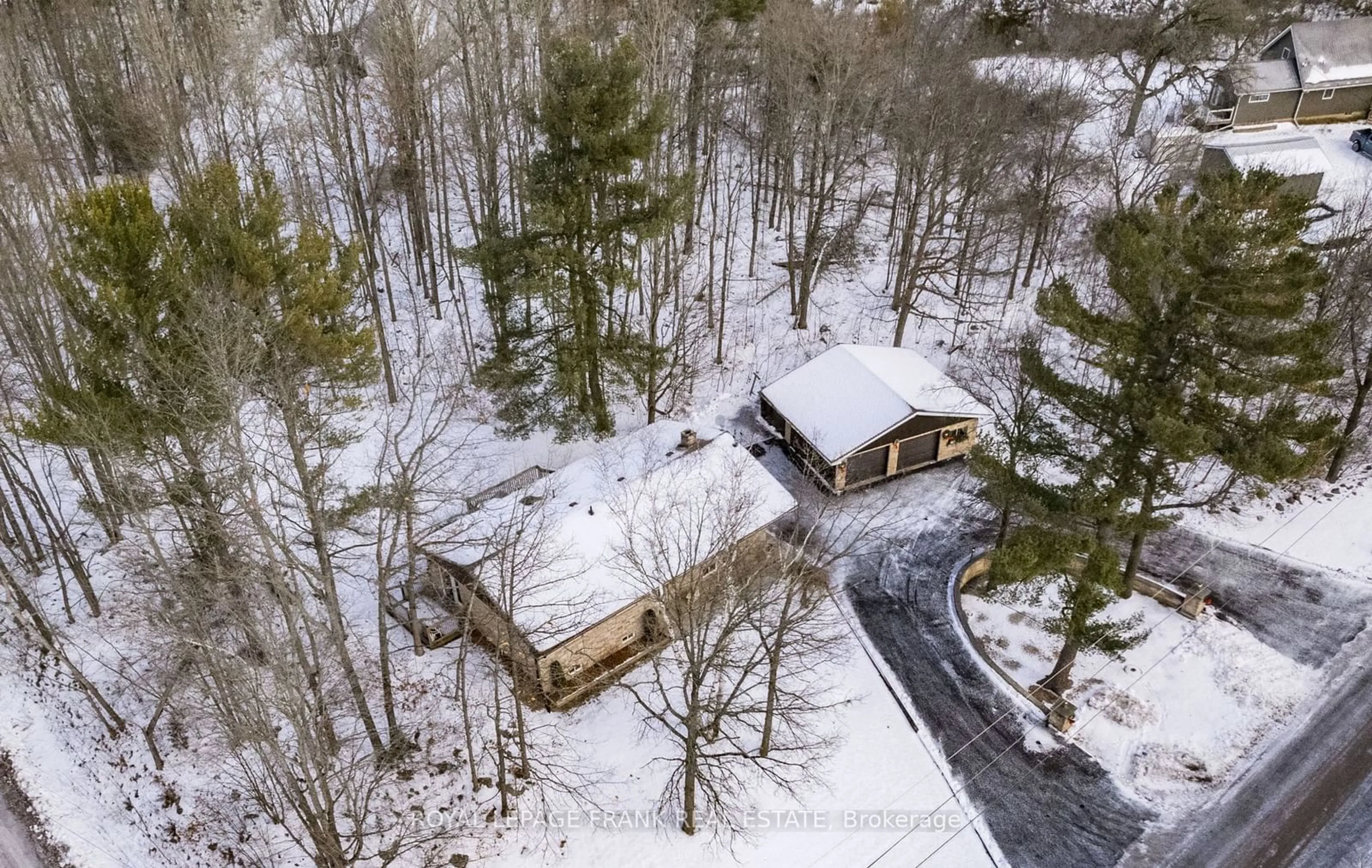 A pic from outside/outdoor area/front of a property/back of a property/a pic from drone, forest/trees view for 82 River Heights Rd, Marmora and Lake Ontario K0K 2M0