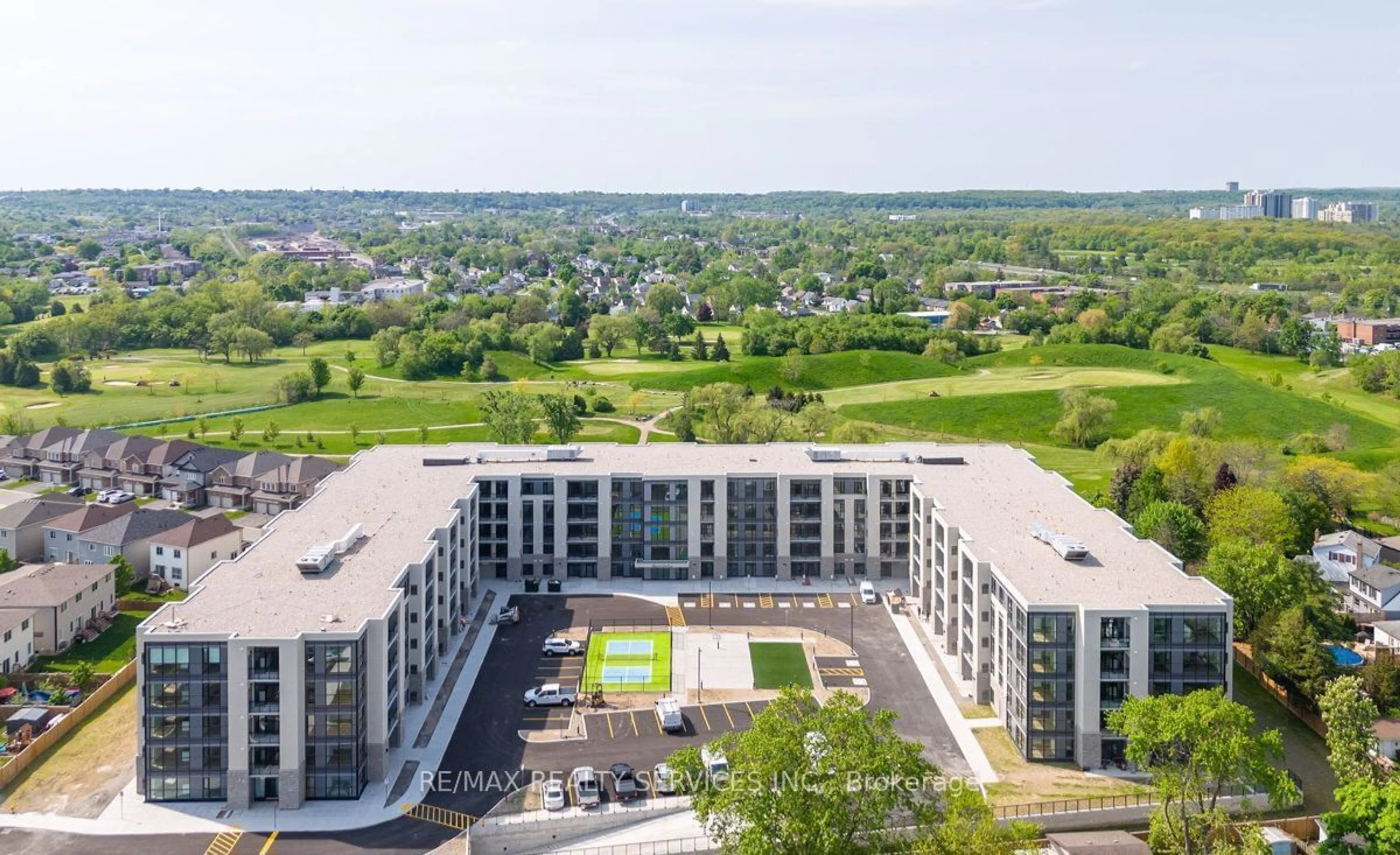 A pic from outside/outdoor area/front of a property/back of a property/a pic from drone, city buildings view from balcony for 50 Herrick Ave #235, St. Catharines Ontario L2P 2T9