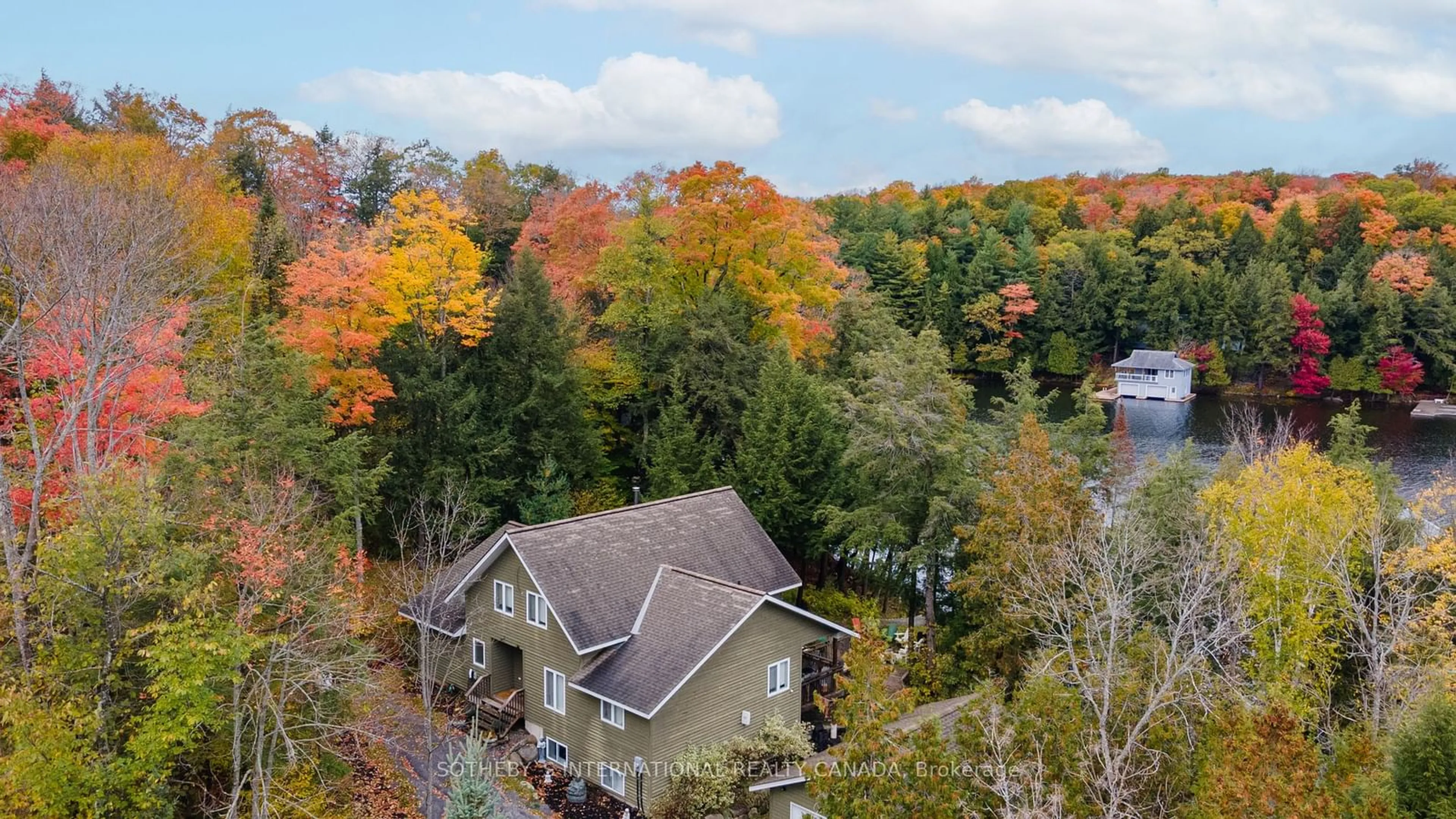 A pic from outside/outdoor area/front of a property/back of a property/a pic from drone, forest/trees view for 1010 Ransbury Rd, Muskoka Lakes Ontario P0B 1J0