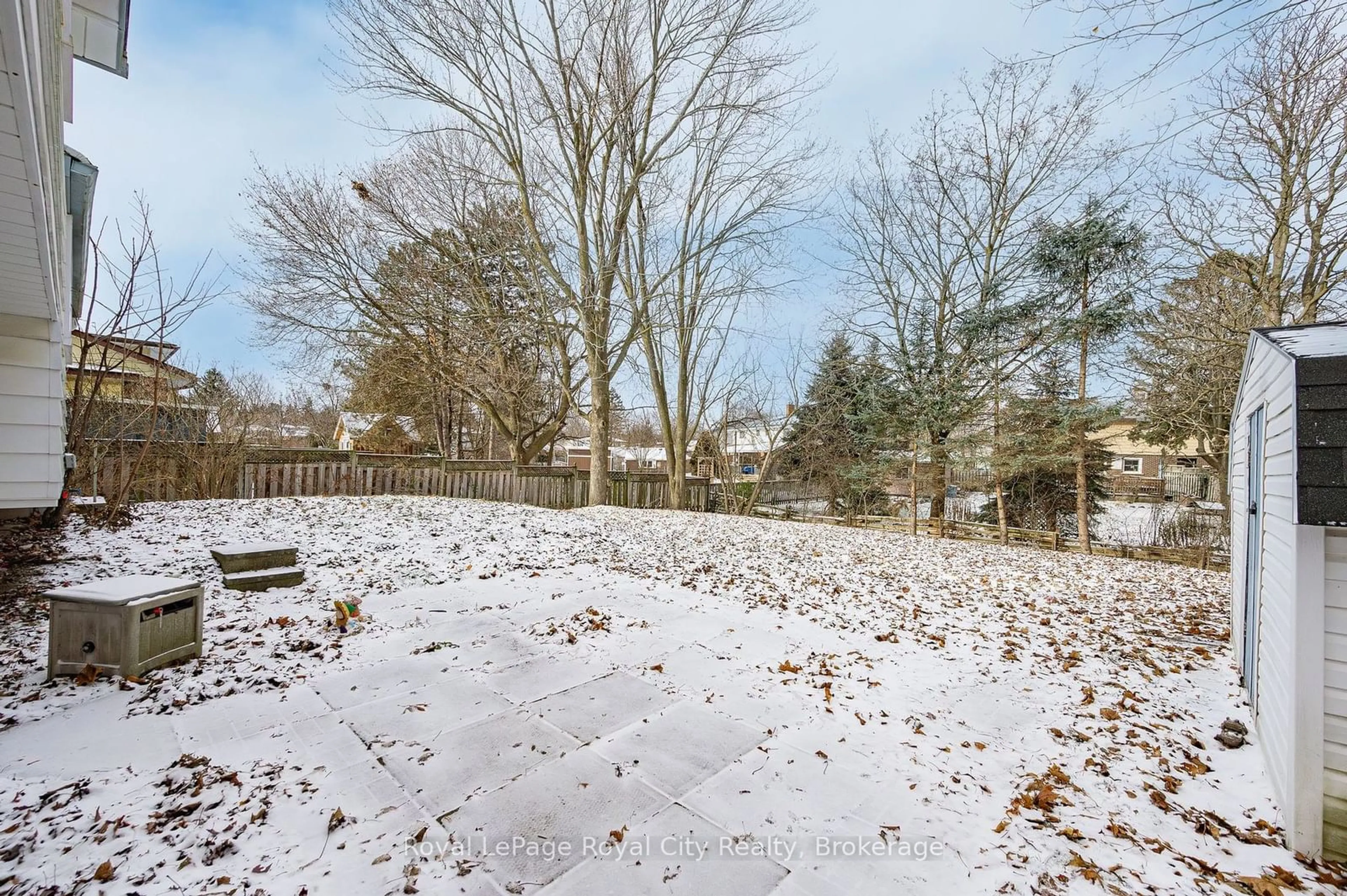 A pic from outside/outdoor area/front of a property/back of a property/a pic from drone, forest/trees view for 65 Balmoral Dr, Guelph Ontario N1E 3N7