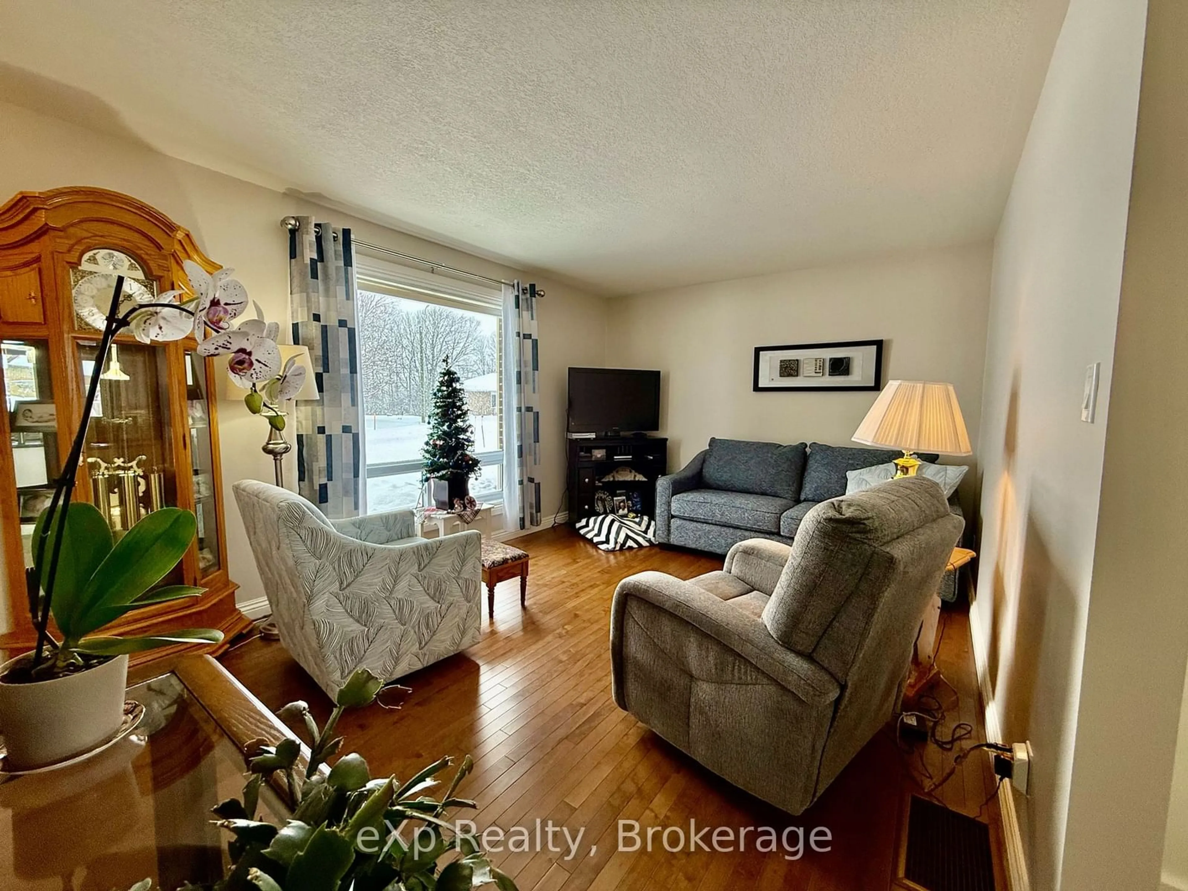 Living room with furniture, wood/laminate floor for 8 Otter Cres, South Bruce Ontario N0G 2J0