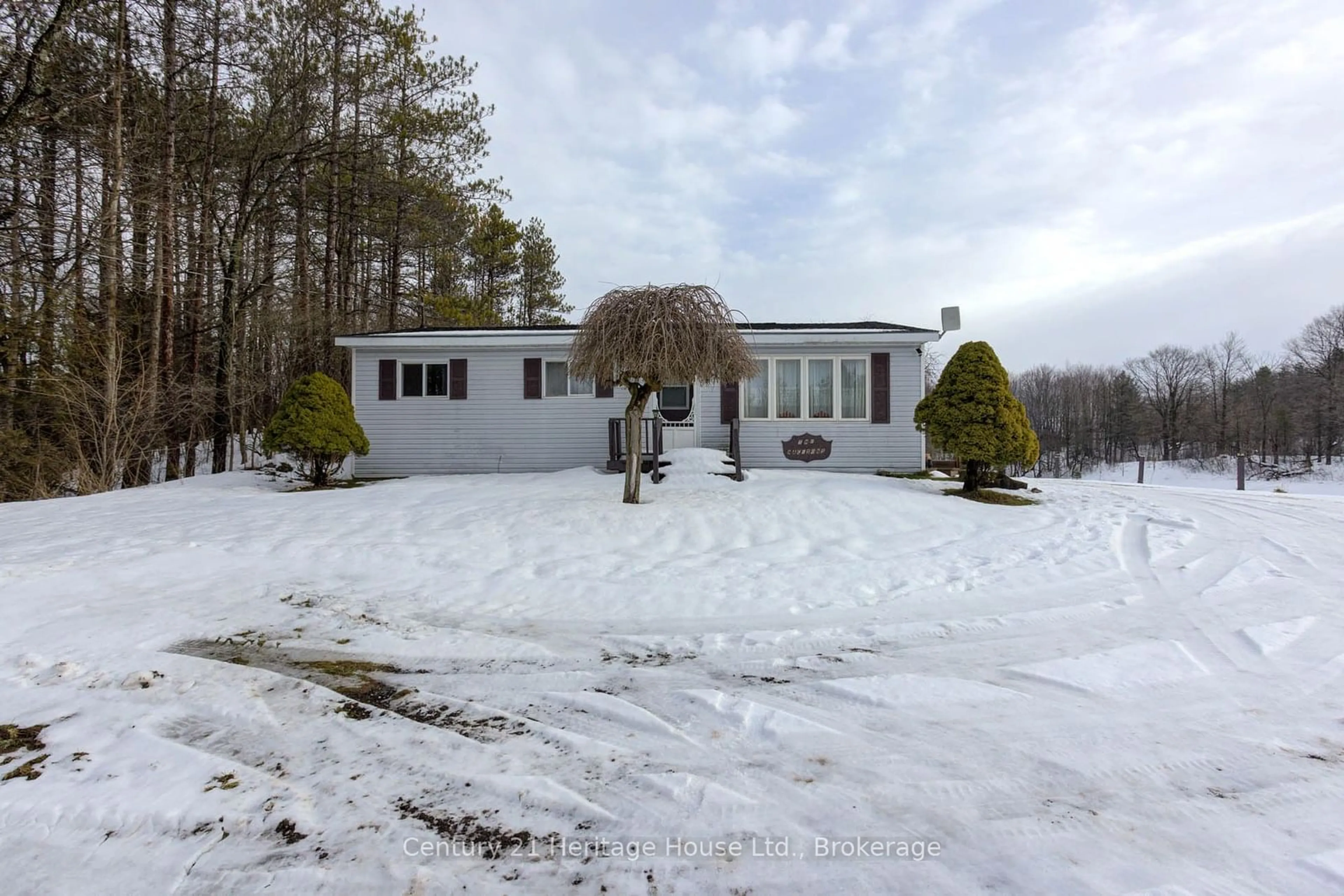 A pic from outside/outdoor area/front of a property/back of a property/a pic from drone, unknown for 633455 Artemesia-Glenelg T Line, Grey Highlands Ontario N0C 1K0