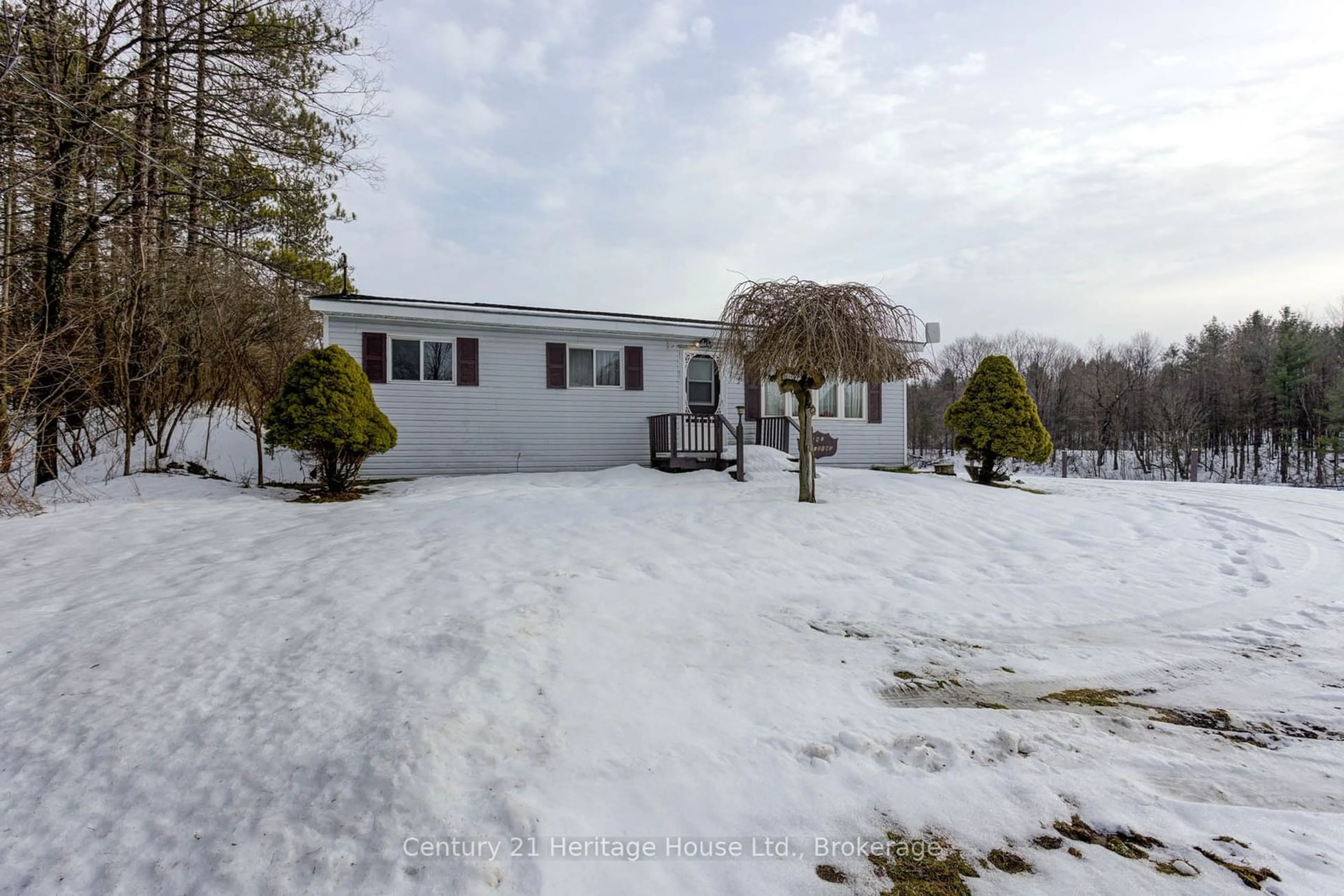 A pic from outside/outdoor area/front of a property/back of a property/a pic from drone, unknown for 633455 Artemesia-Glenelg T Line, Grey Highlands Ontario N0C 1K0