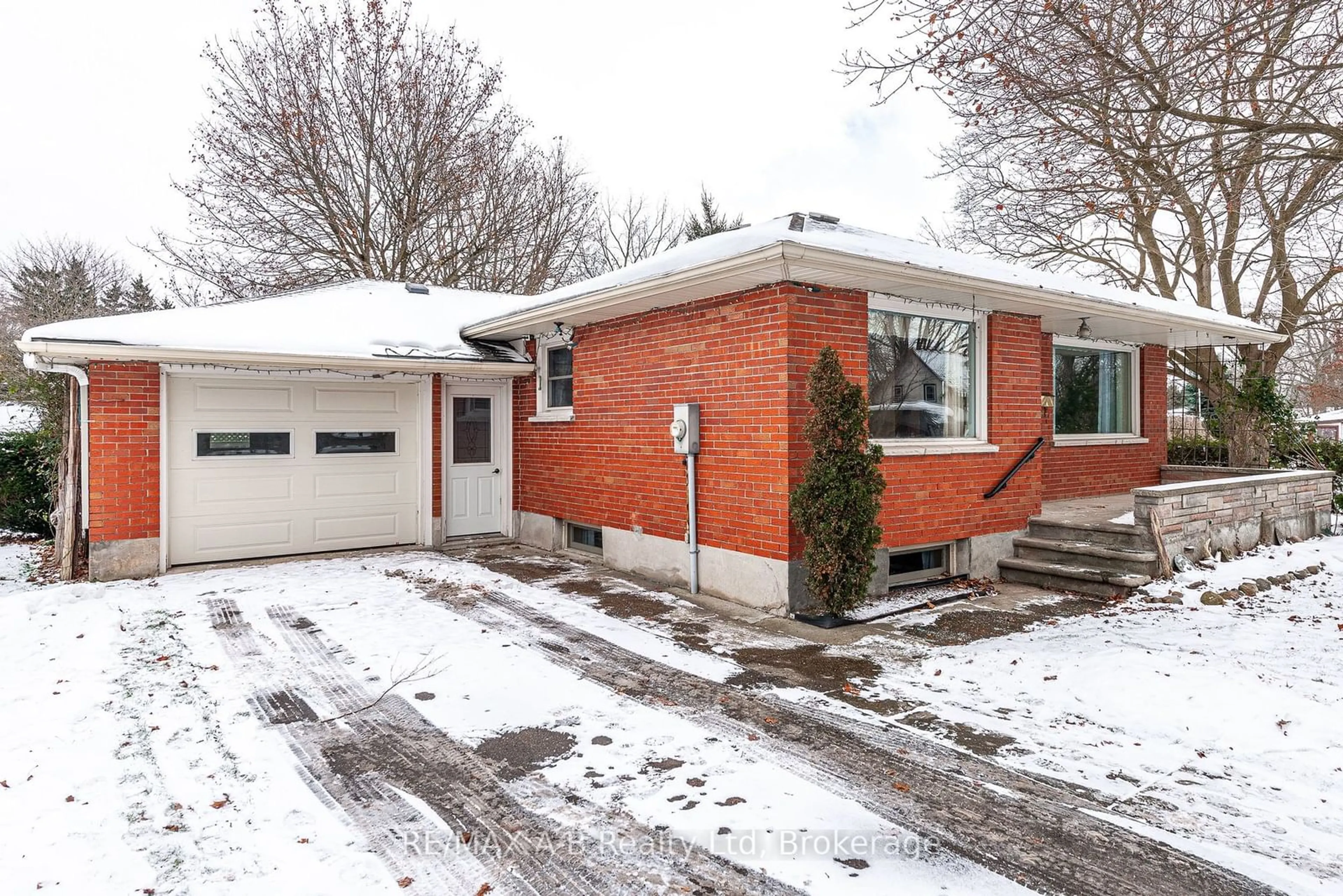 Home with brick exterior material, street for 55 Huron St, St. Marys Ontario N4X 1C2