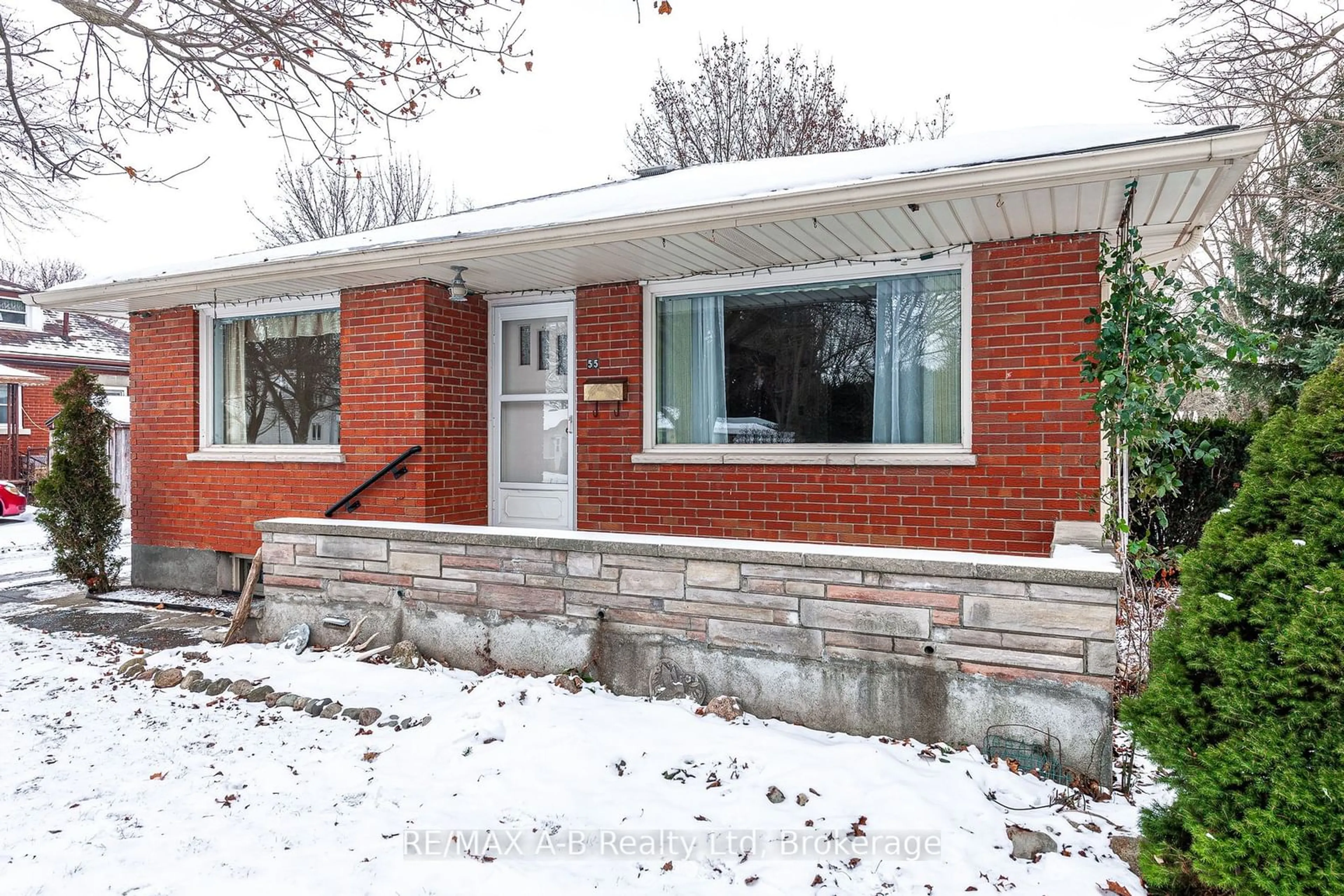 Home with brick exterior material, street for 55 Huron St, St. Marys Ontario N4X 1C2