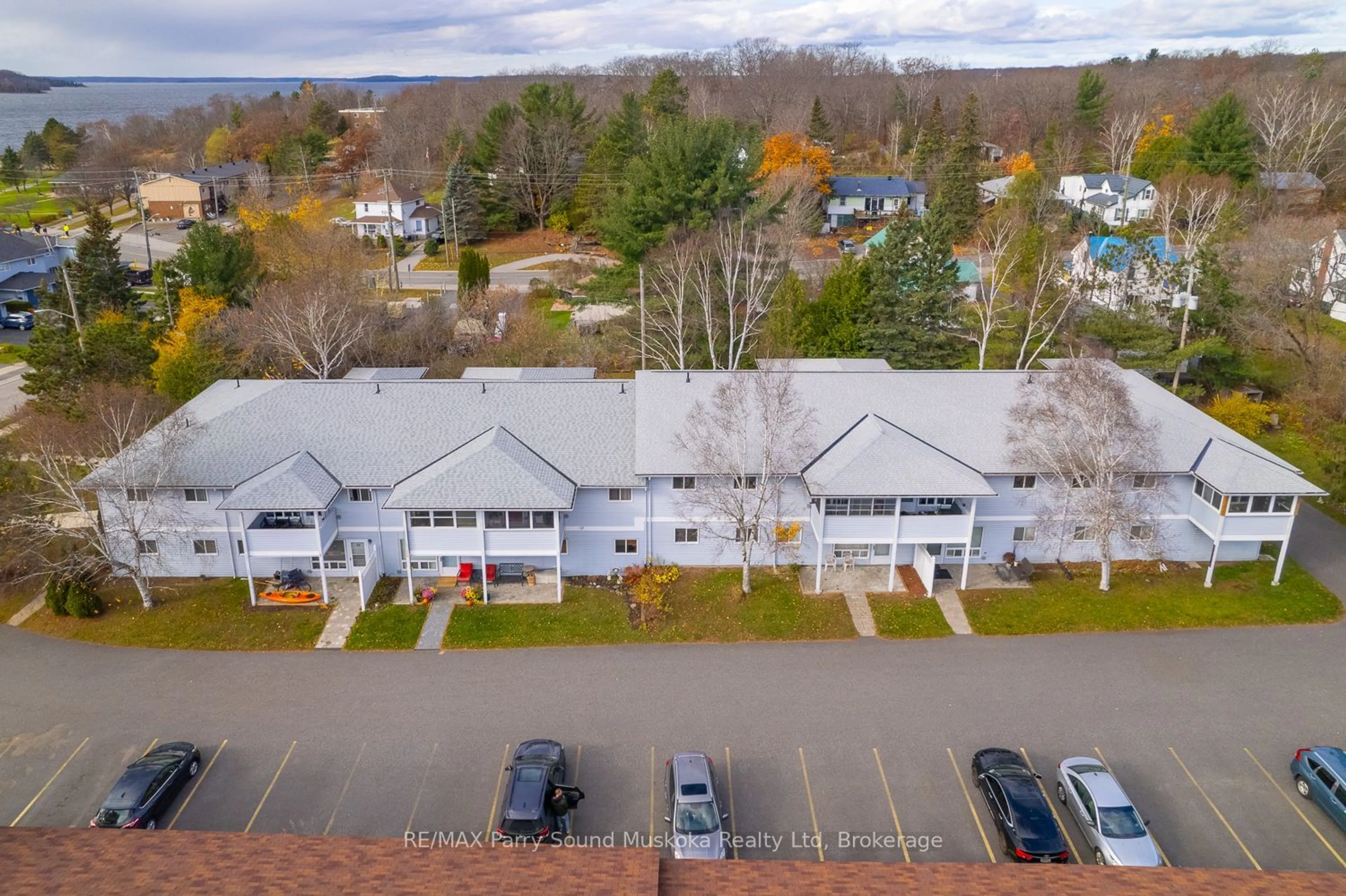 A pic from outside/outdoor area/front of a property/back of a property/a pic from drone, unknown for 1 Georgian Bay Ave #105, Parry Sound Ontario P2A 3B1