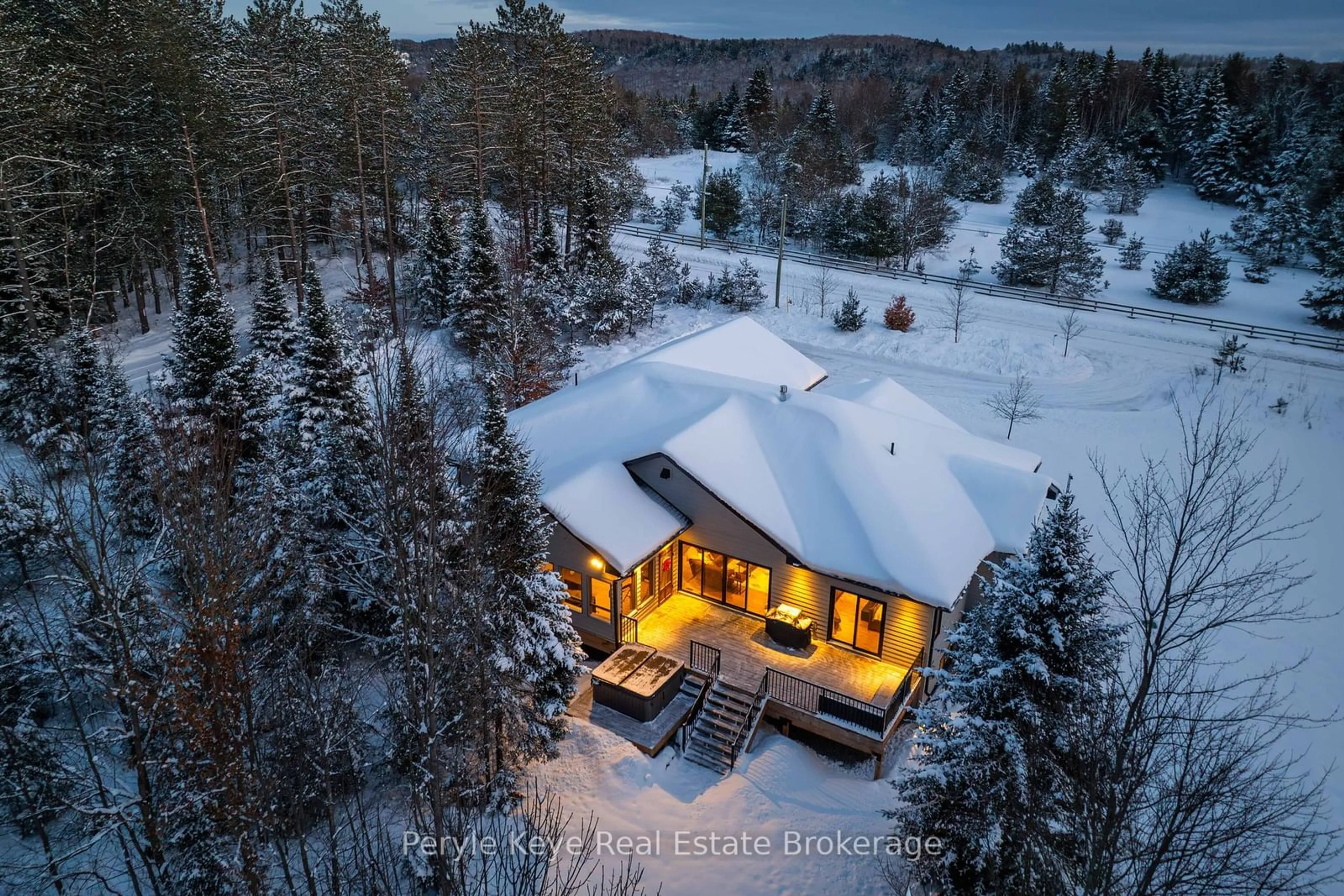 A pic from outside/outdoor area/front of a property/back of a property/a pic from drone, forest/trees view for 450 Fowlers Rd, Huntsville Ontario P1H 2N5