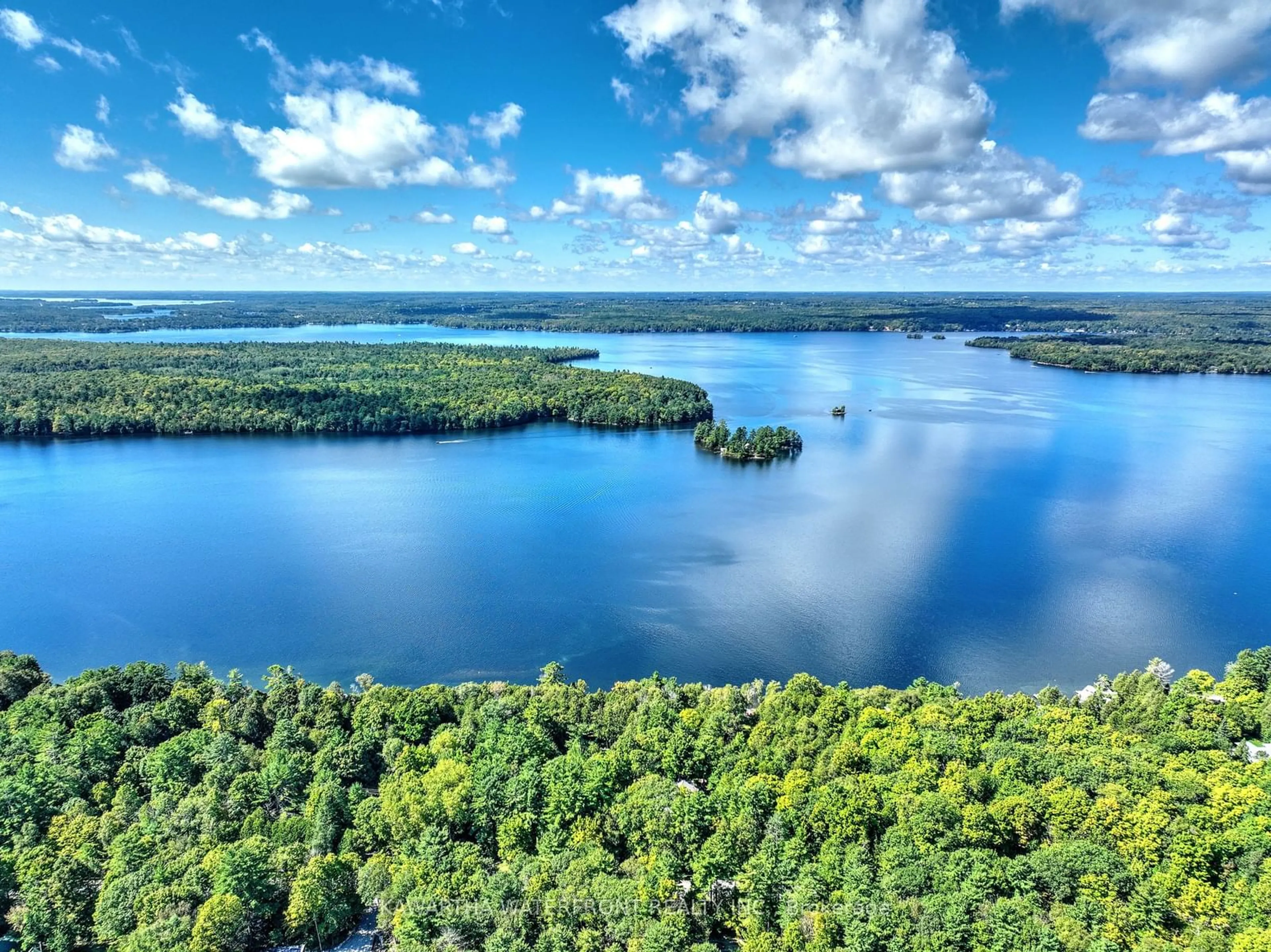 A pic from outside/outdoor area/front of a property/back of a property/a pic from drone, water/lake/river/ocean view for 127 Sugarbush Cres, Galway-Cavendish and Harvey Ontario K0L 1J0